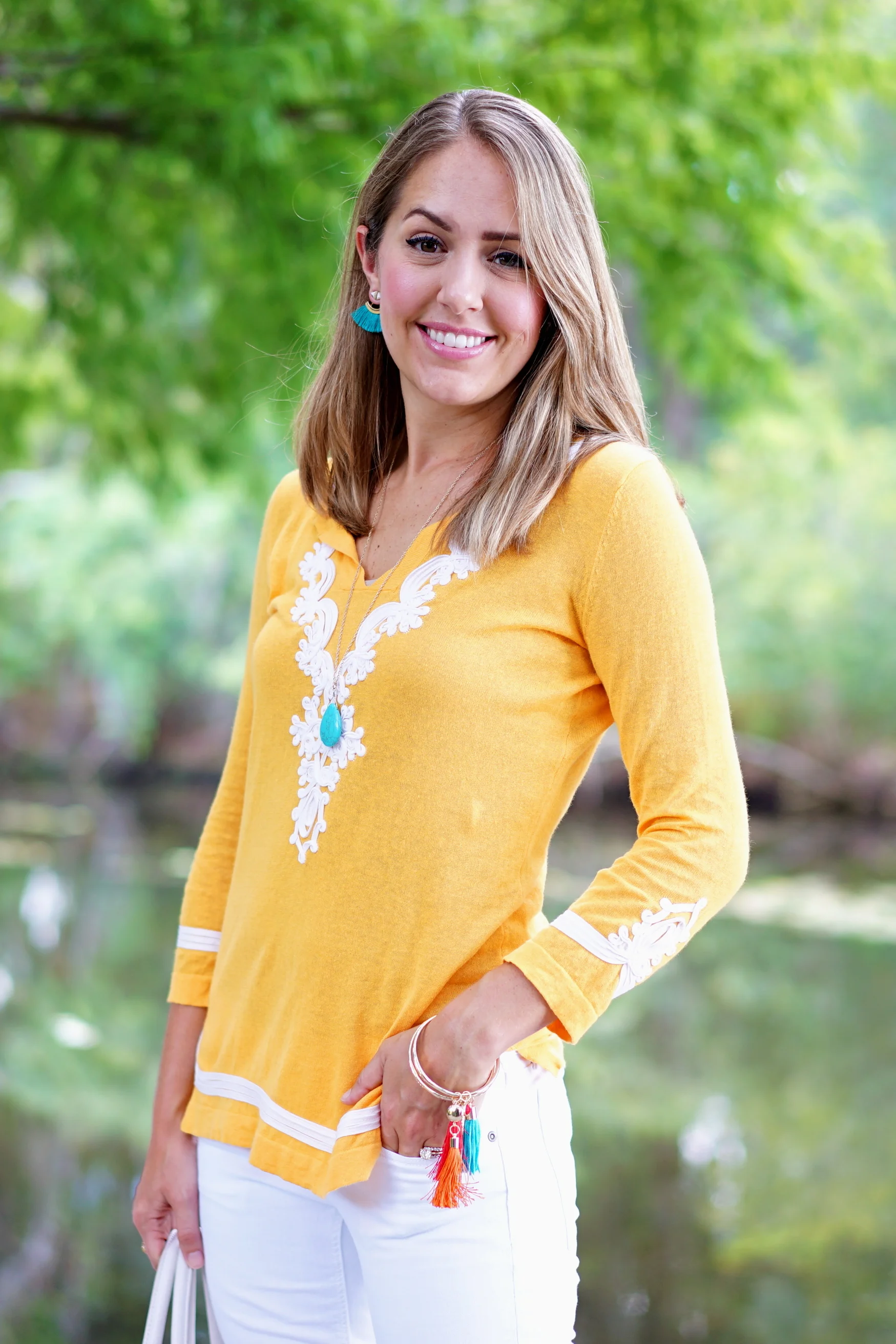 Yellow sweater, turquoise jewelry