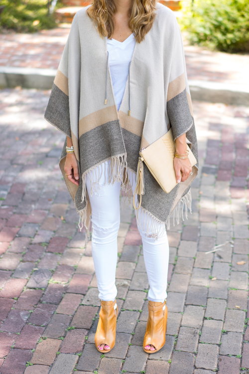 Neutral+striped+poncho+with+white+jeans.jpeg