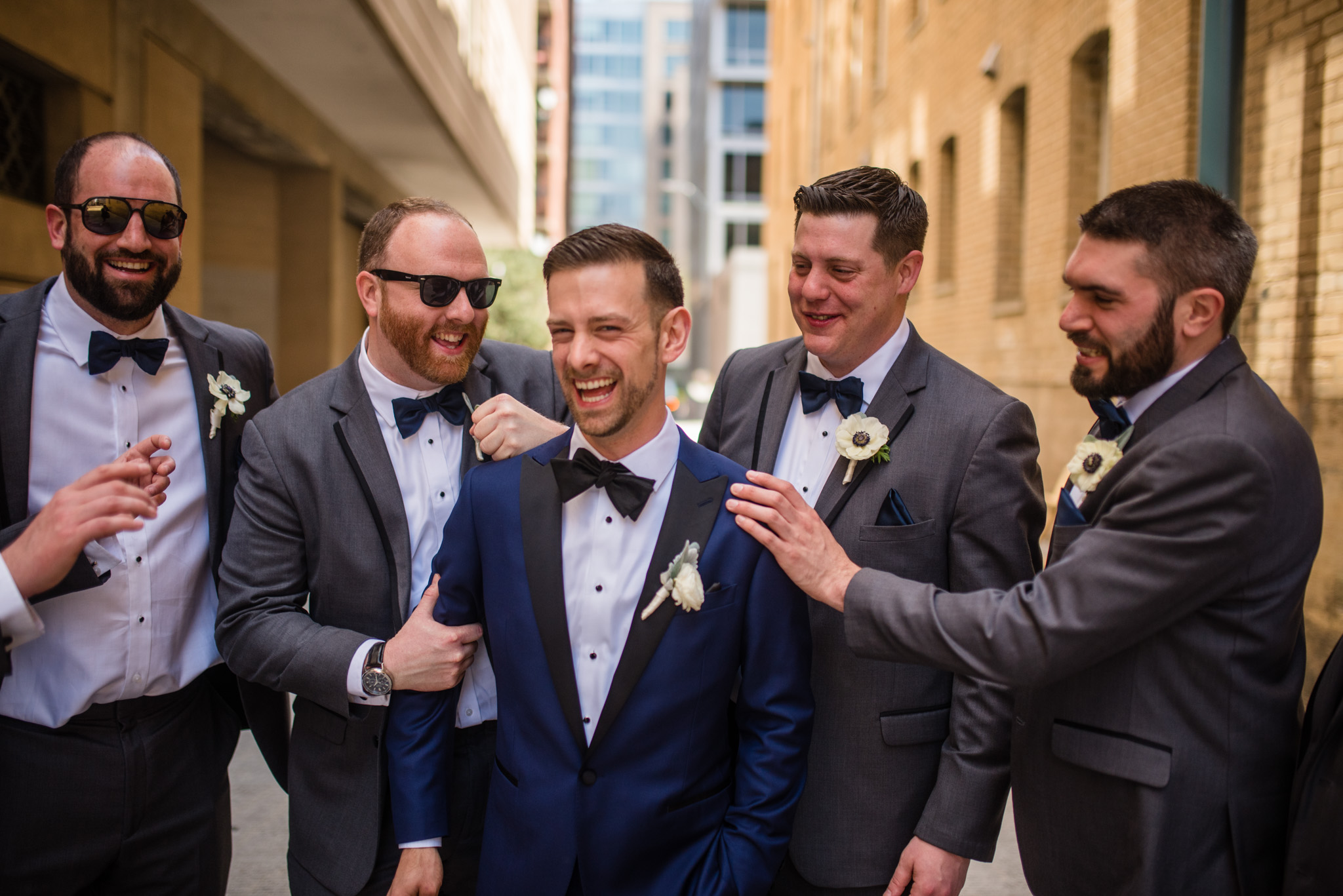 Navy groom gray groomsmen with bowties