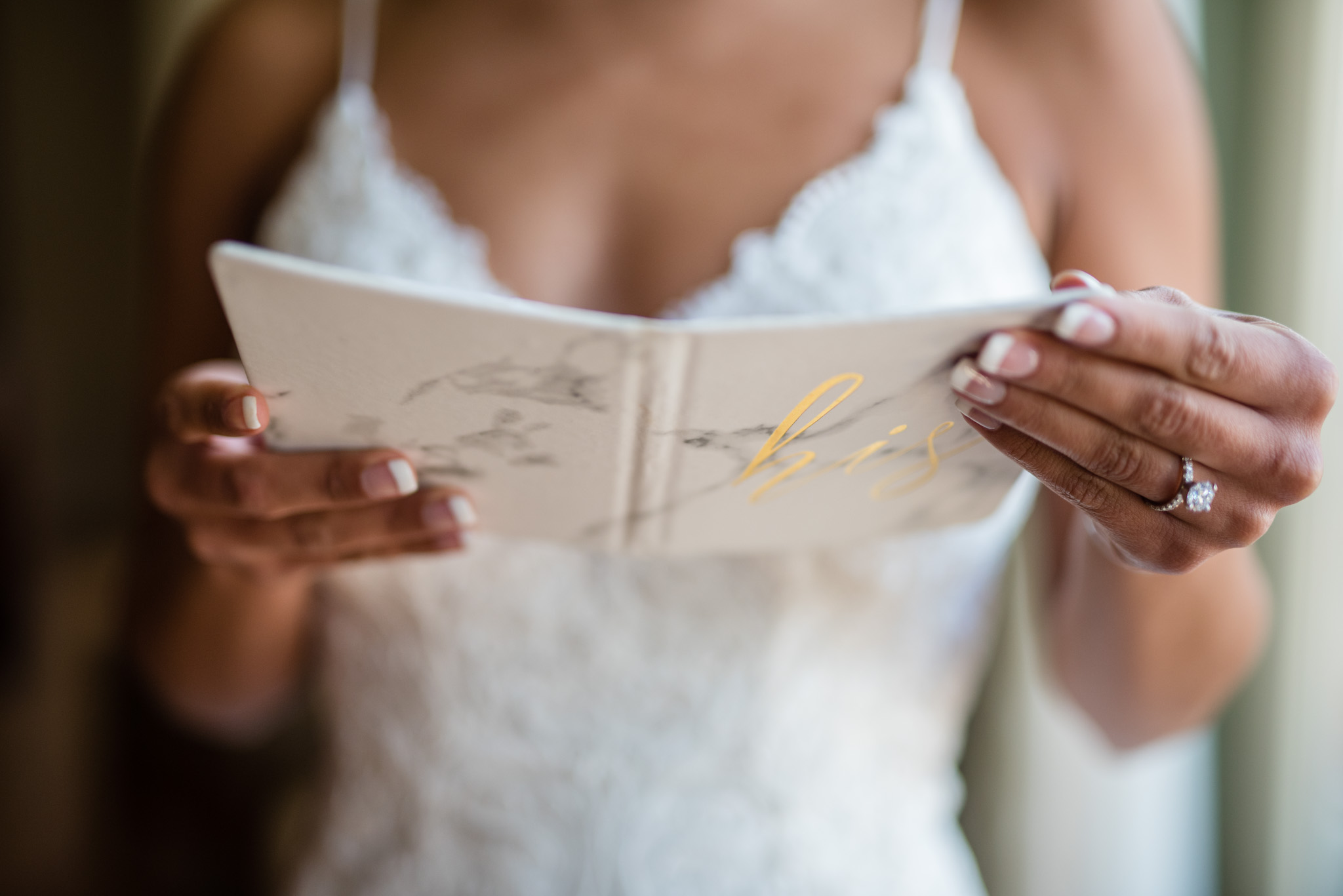 Bride reads a note from her groom