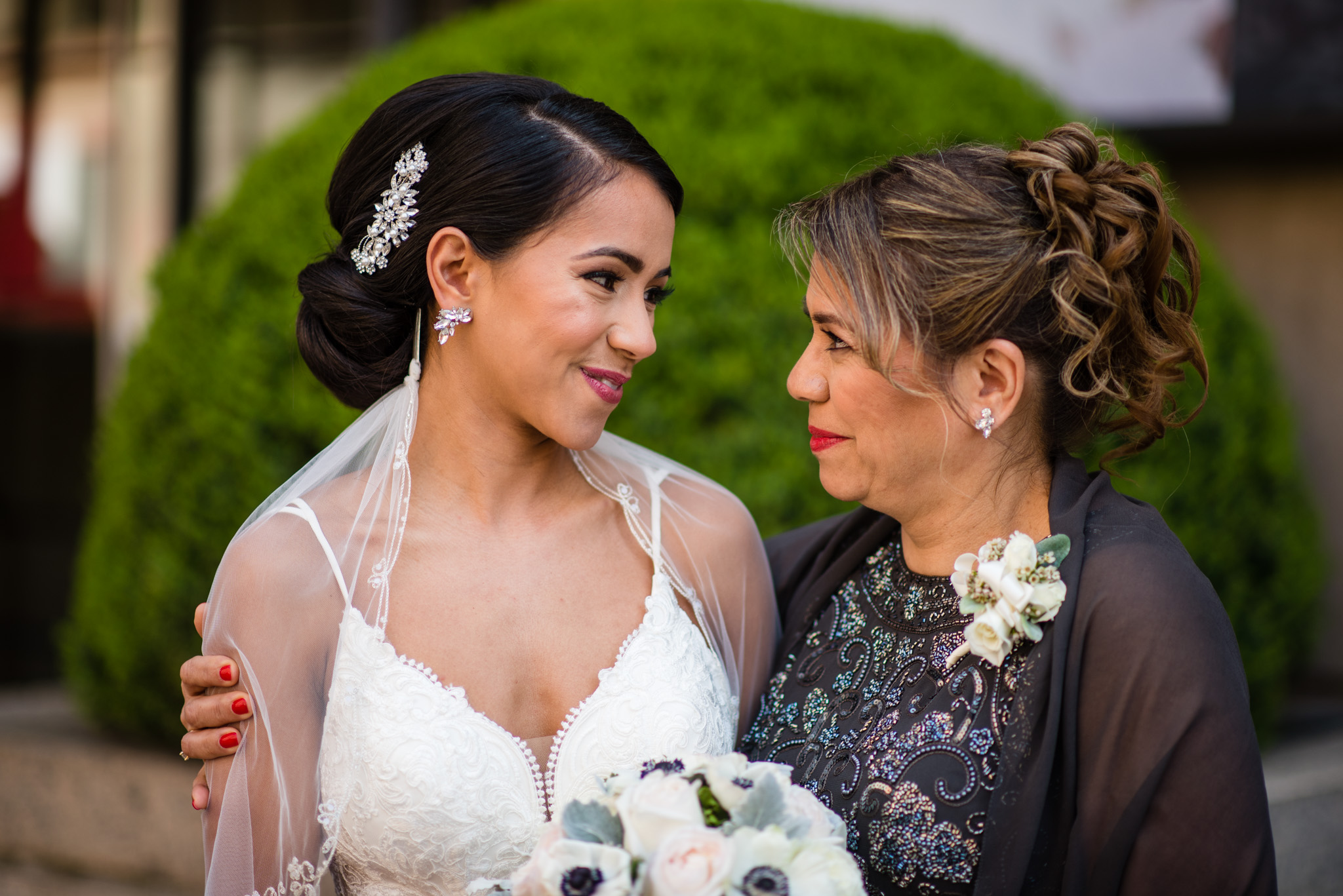 Bride and her mother enjoy a quiet moment together