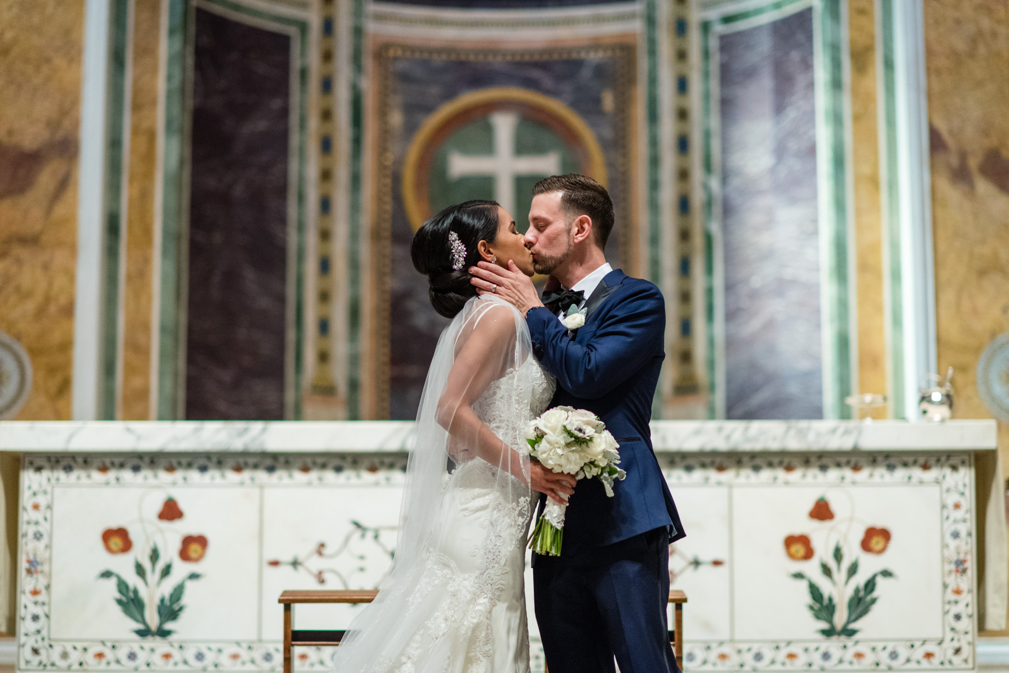 The first kiss at a catholic wedding