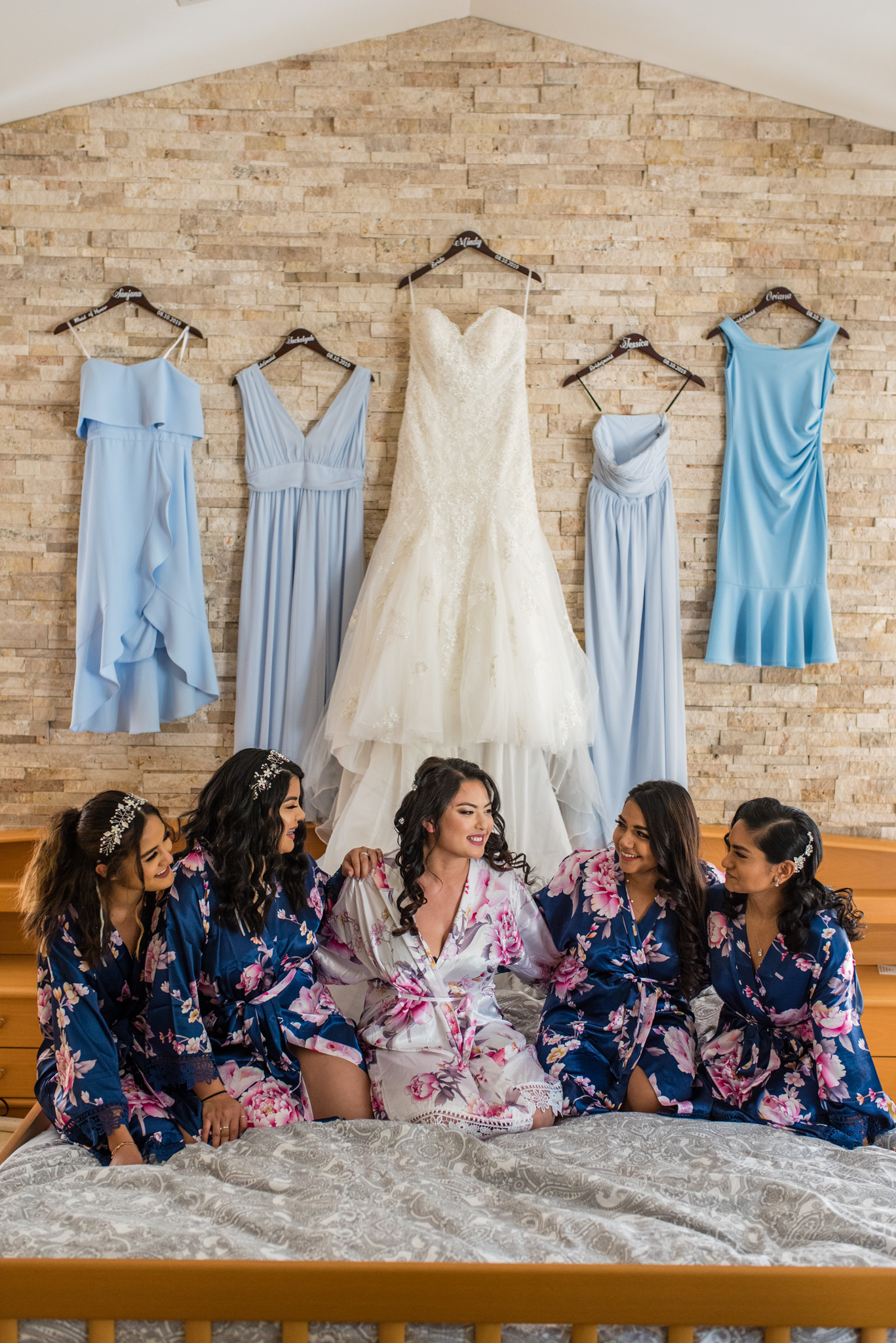 Bride and Bridesmaids with their blue dresses