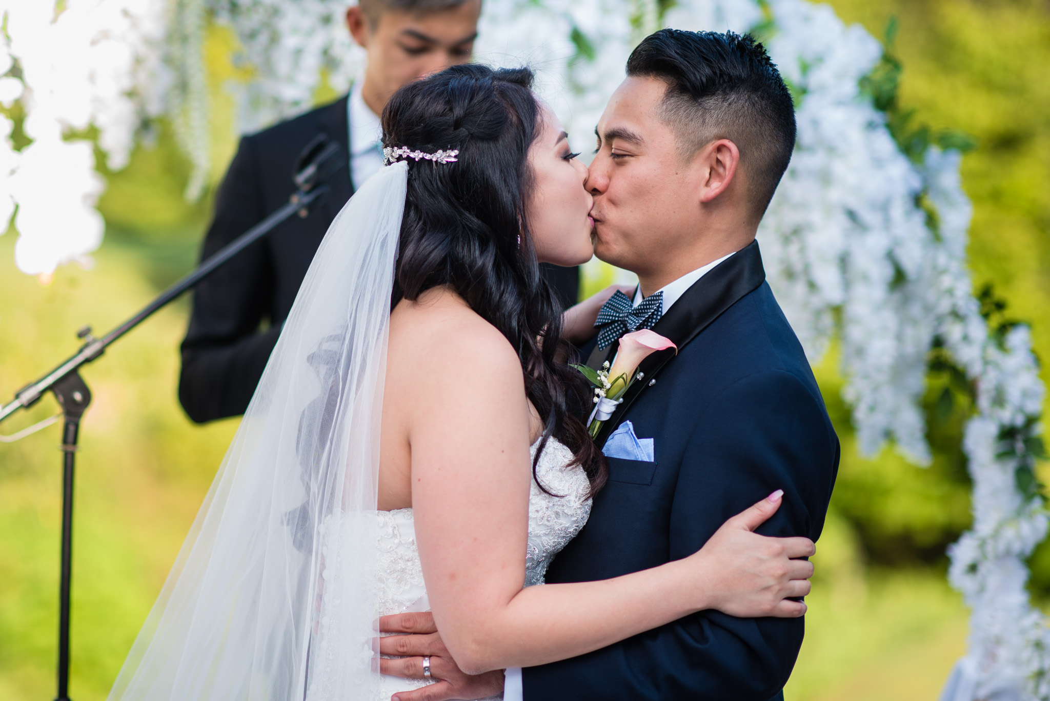 Bride and groom first kiss