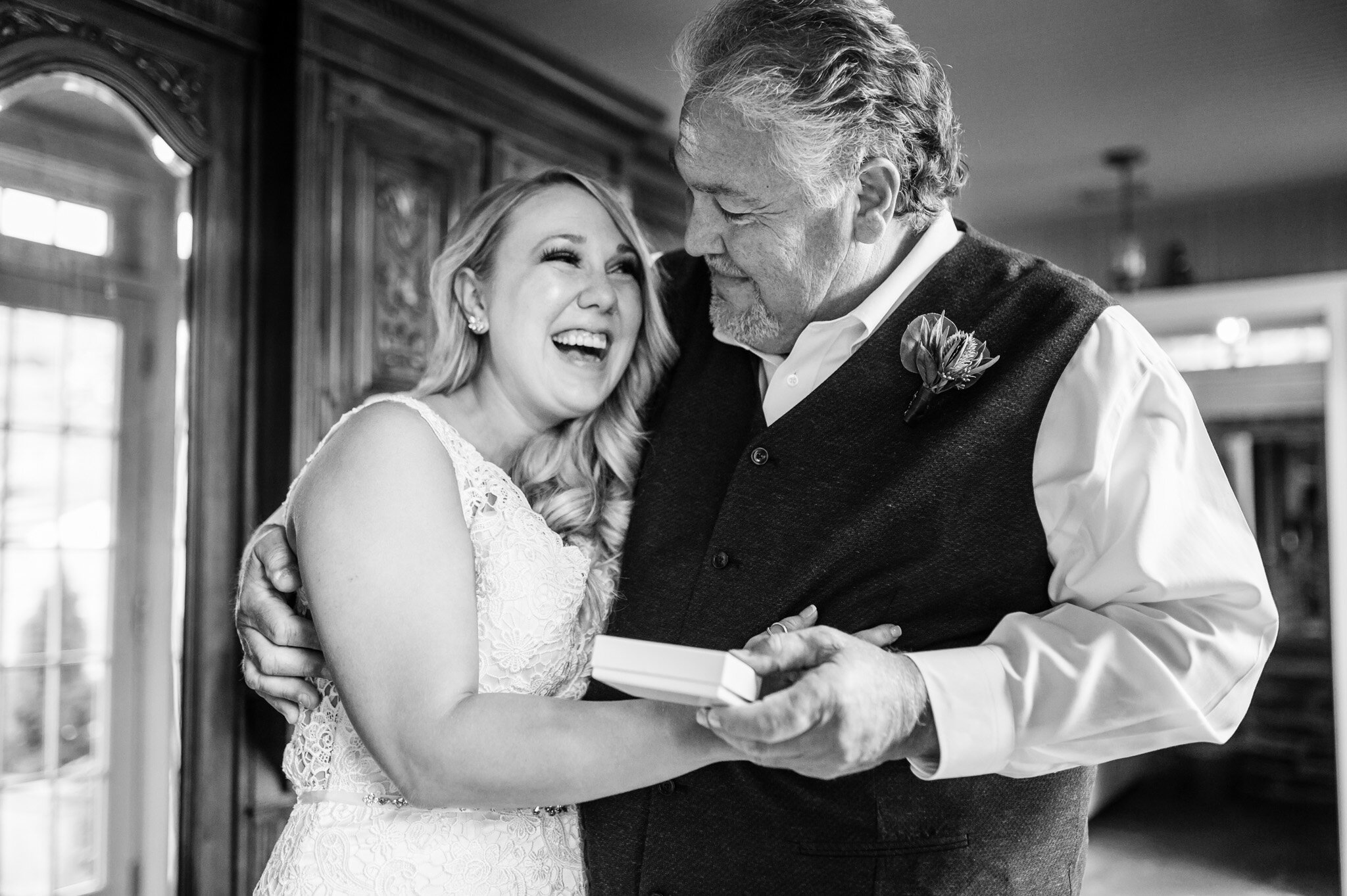 Bride and her dad sharing a moment