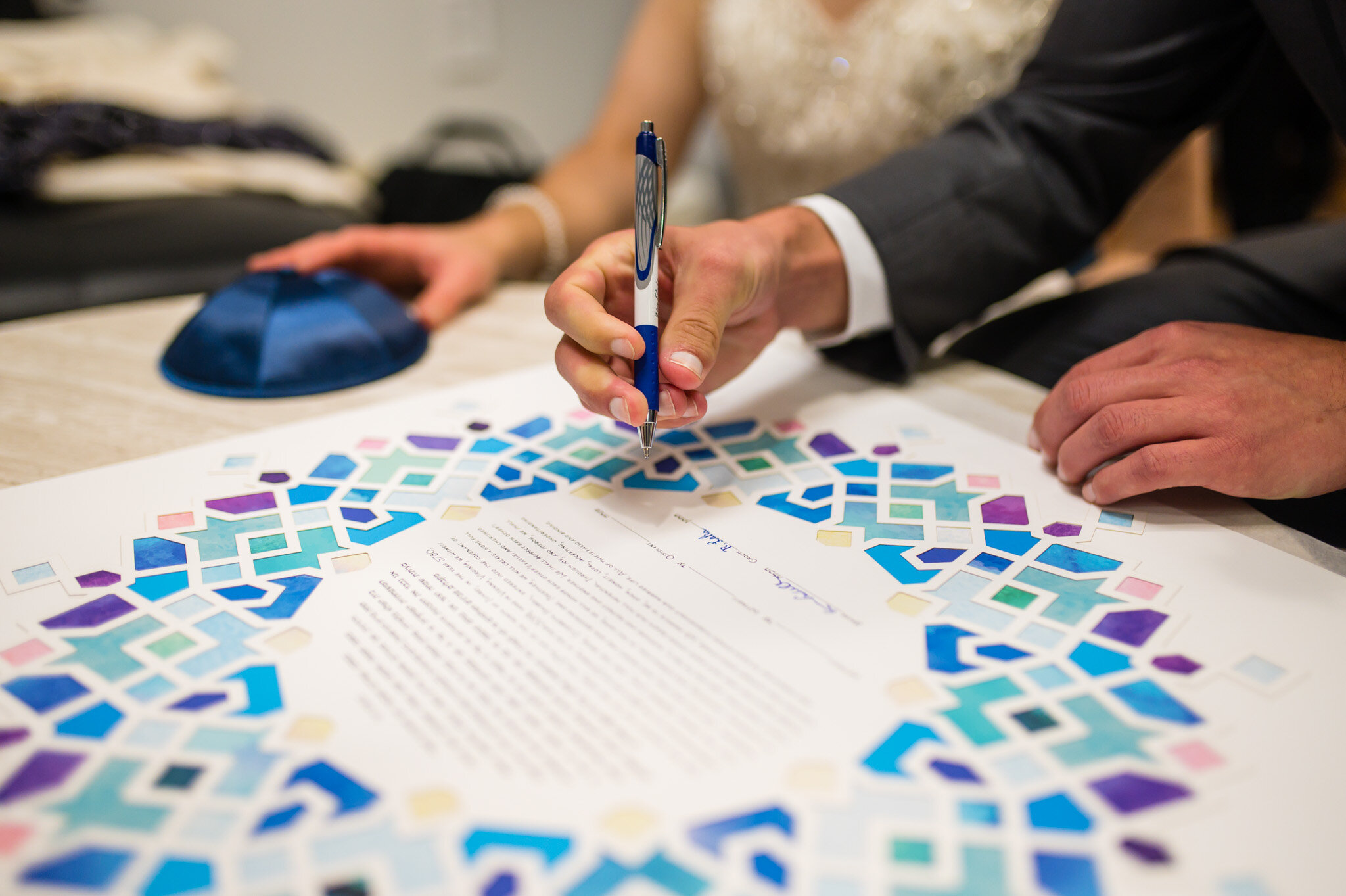 Jewish wedding ketubah signing
