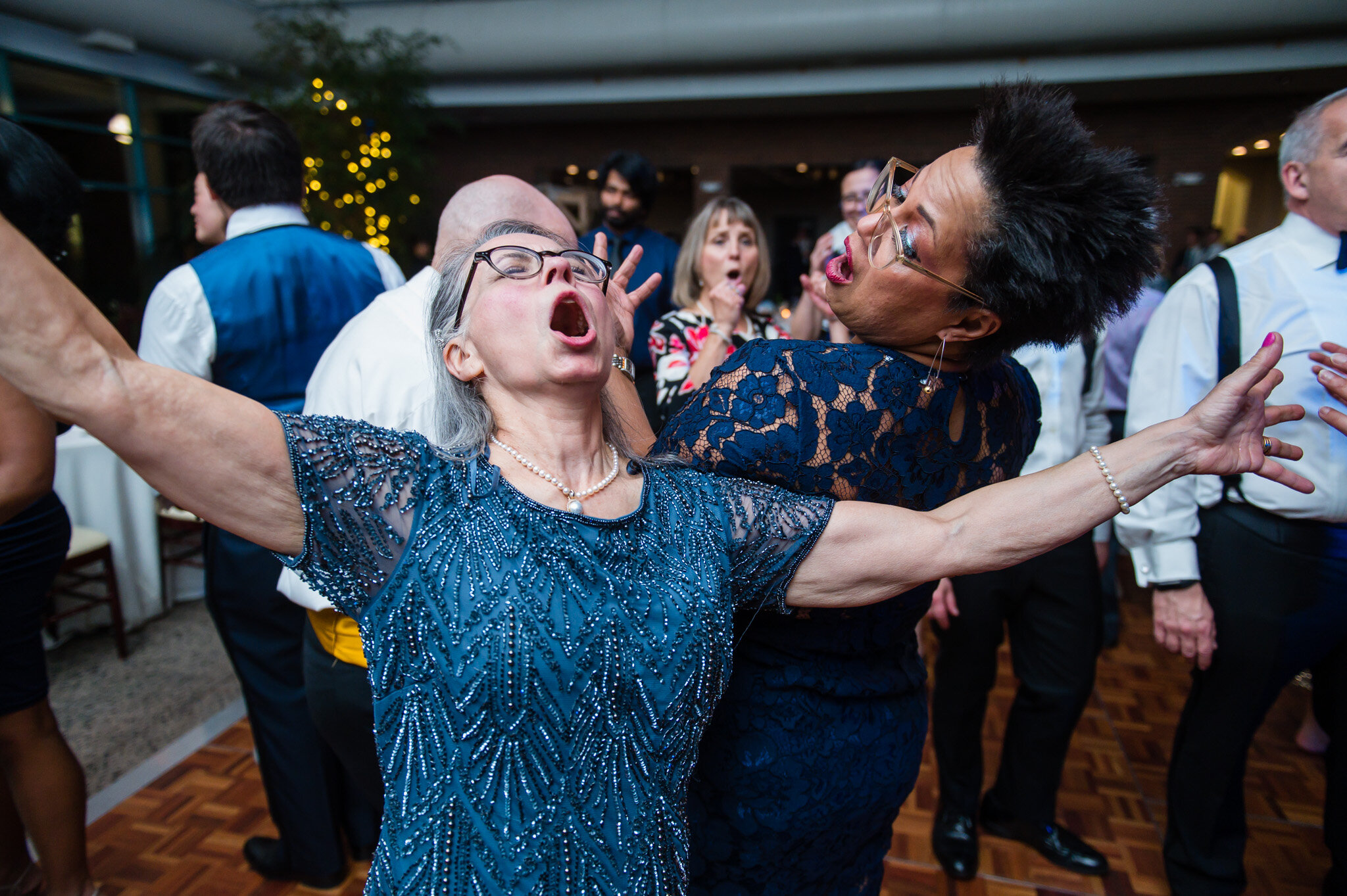 The mother-of-the-bride dancing at a wedding reception