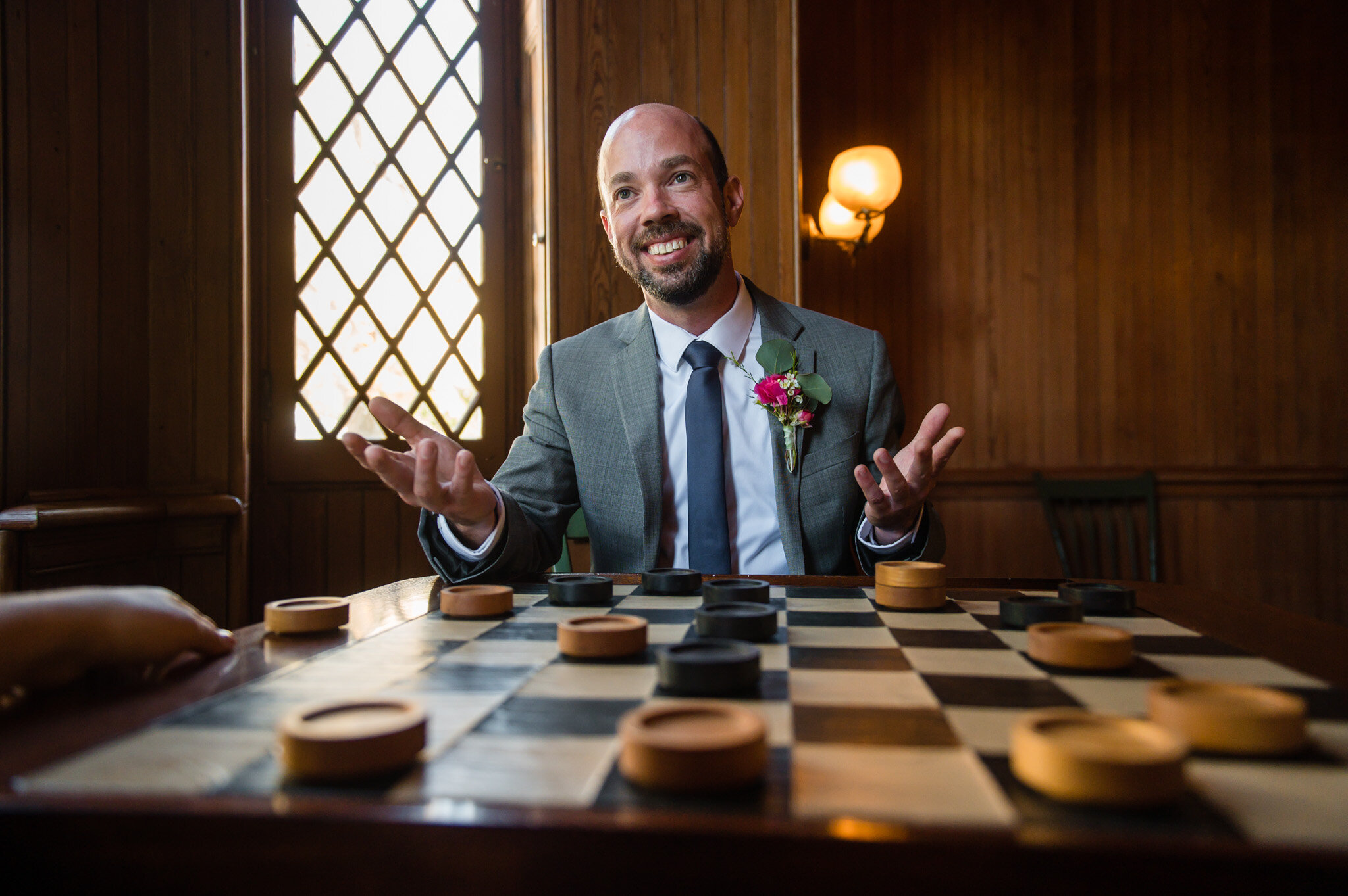 groom playing checkers