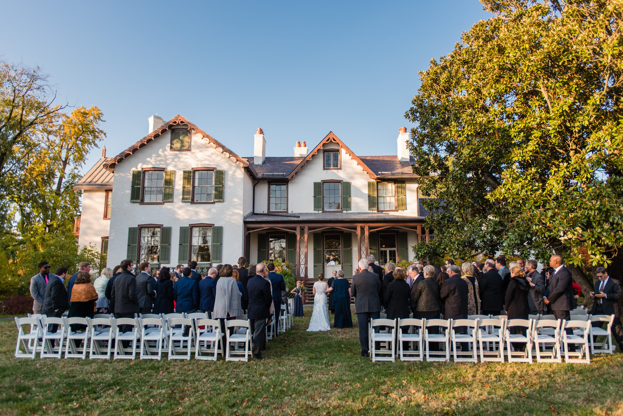 Outdoor wedding in front of Lincoln's Cottage