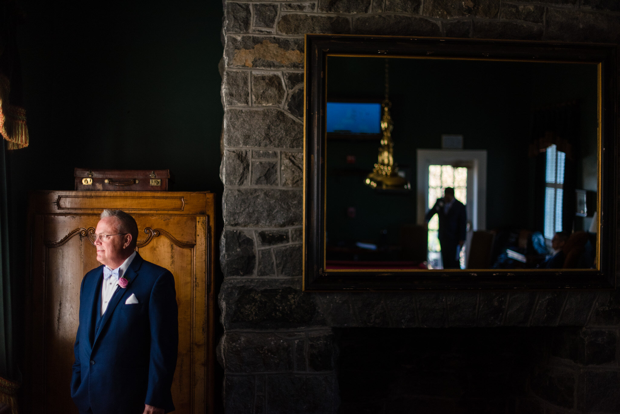 Creative portrait of a groom before his wedding at Belmont Country Club