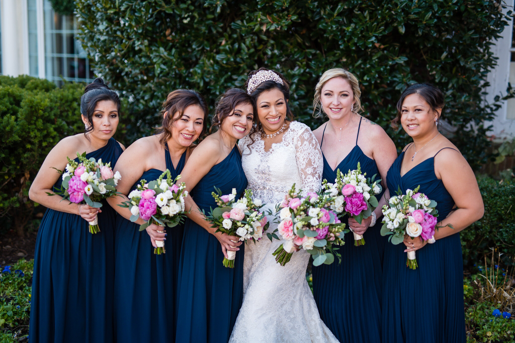 Bride with her bridesmaids at her wedding in Northern Virginia.