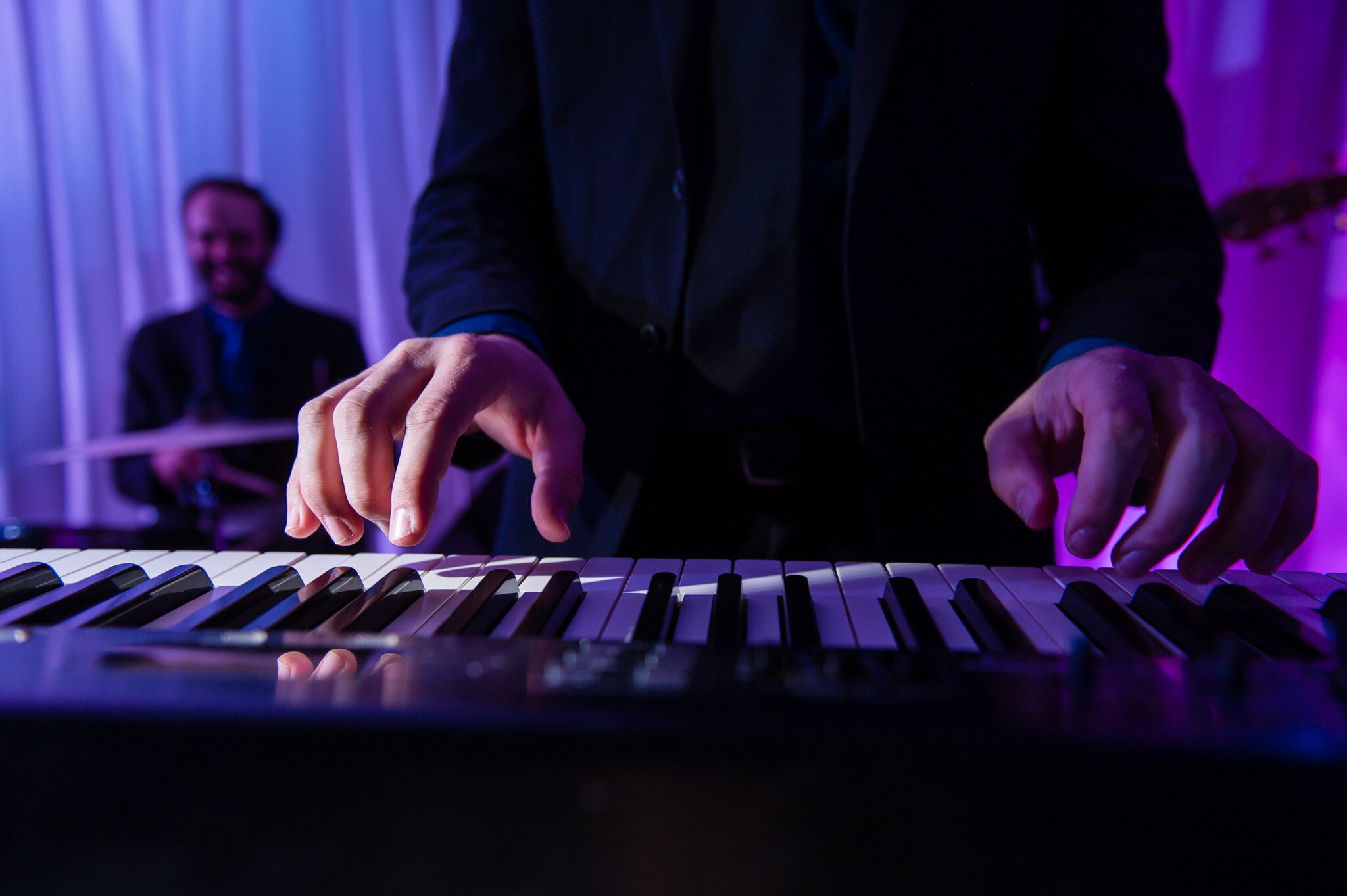 Bachelor Boys keyboard player at a wedding reception