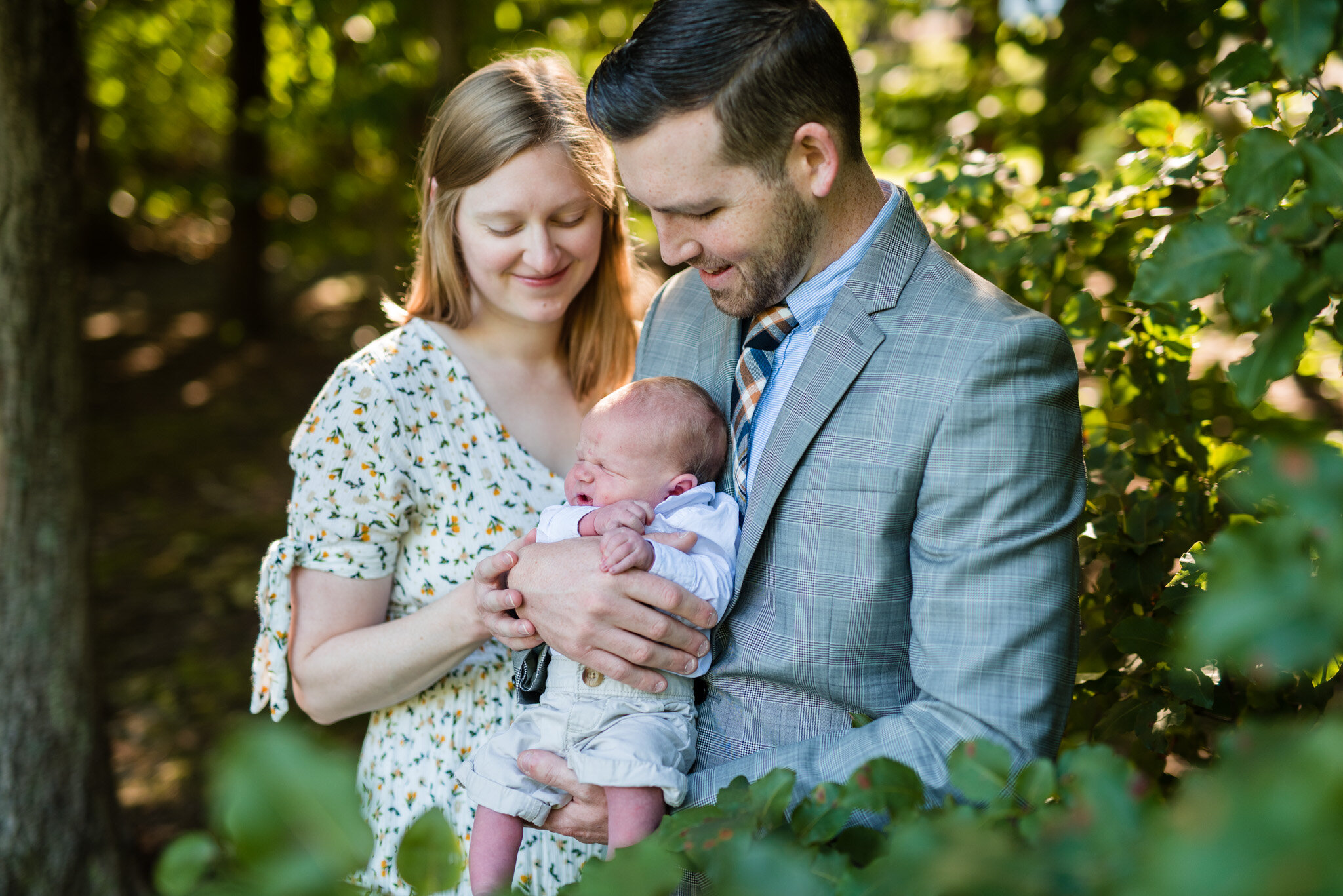 A mother, father, and their newborn son at their family session in Woodbridge, Virginia.