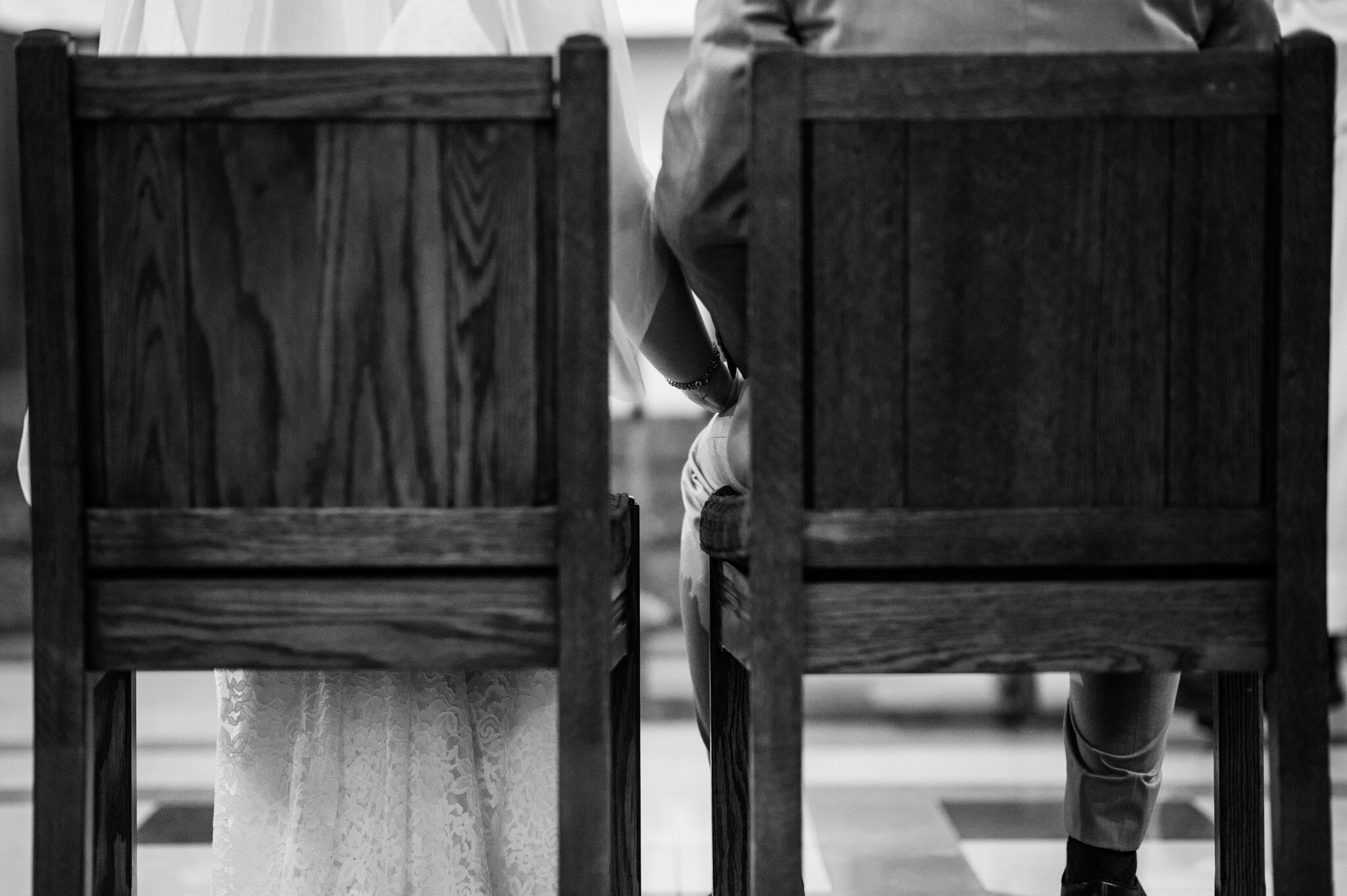 A bride and groom holding hands