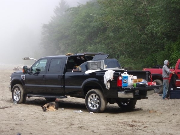 Kaiser guards the truck on a camping trip to Neah Bay 