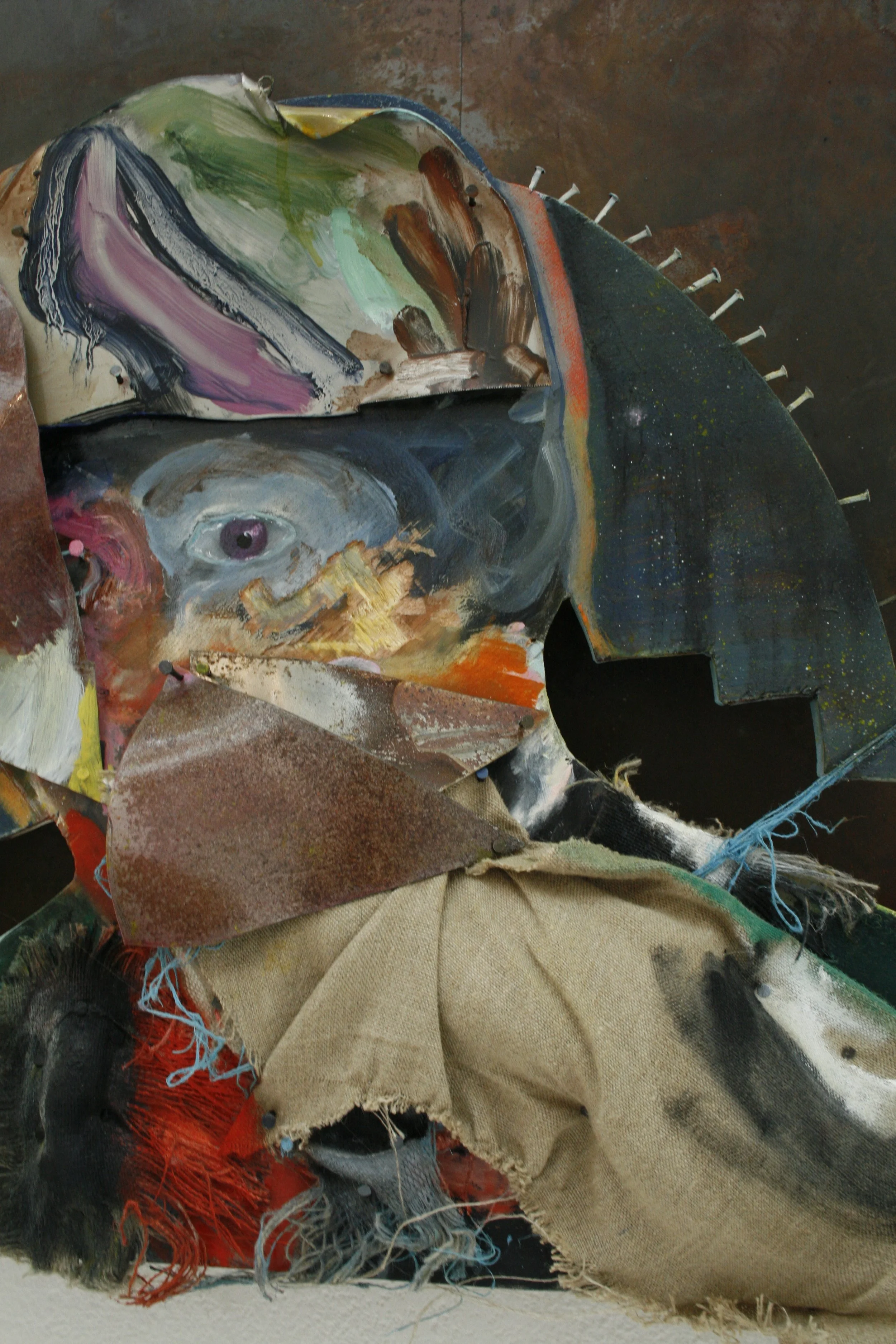 Low Flying Owls (2009), close-up of a mixed-media work by British artist Jonathan Joubert combining painting, steel, found material and plywood.