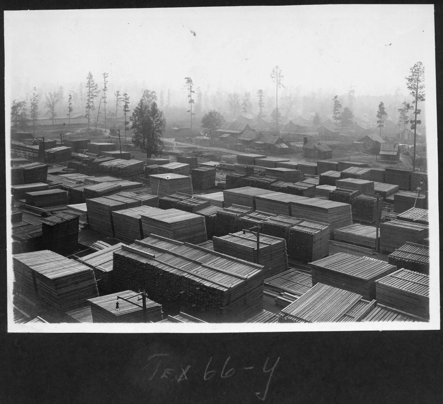 Tex66 Lumber Yard with Housing in Background