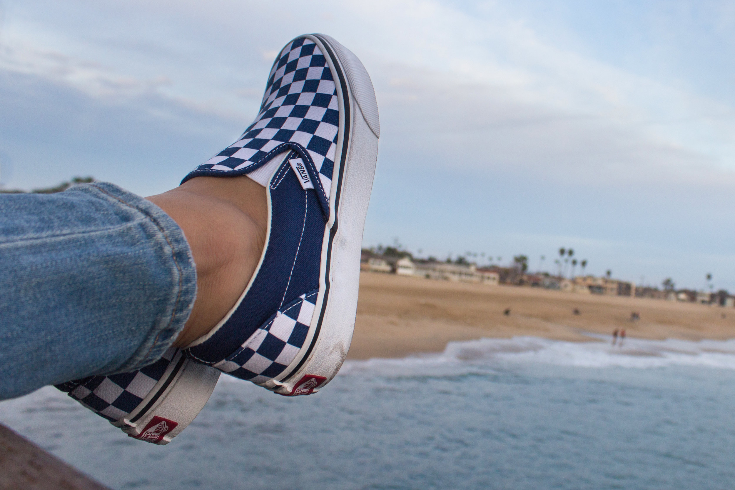 vans blue checkerboard on feet