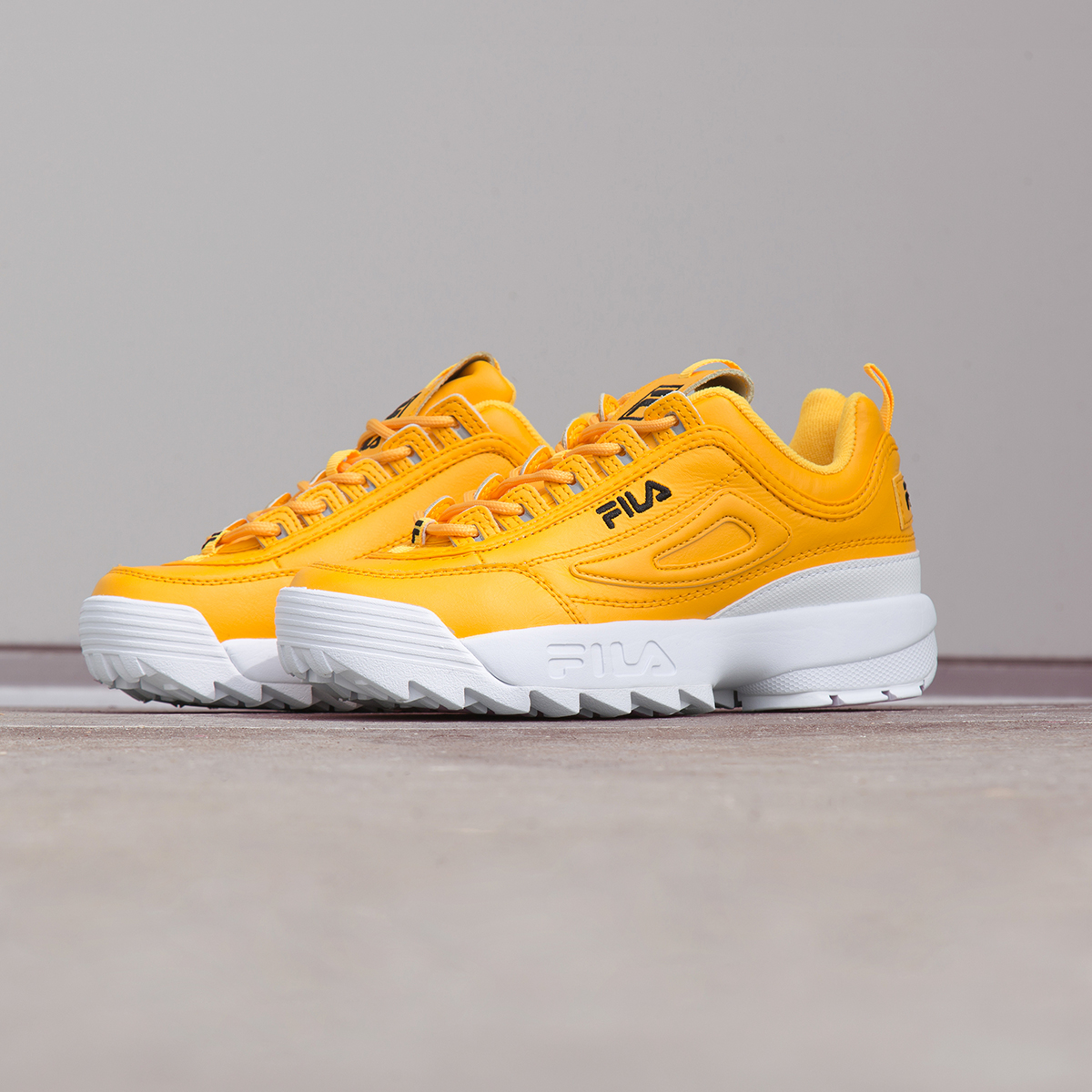 yellow fila shoes disruptor