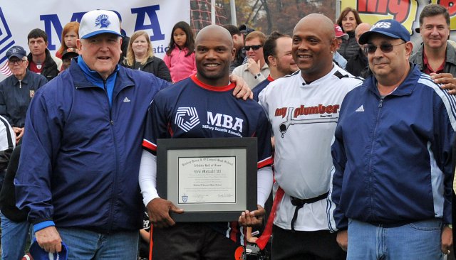 Metcalf is pictured above before a charity game against the Wounded Warrior Amputee Football Team when he was inducted into the O'Connell Hall of Fame two years ago. (U.S. Army photo)