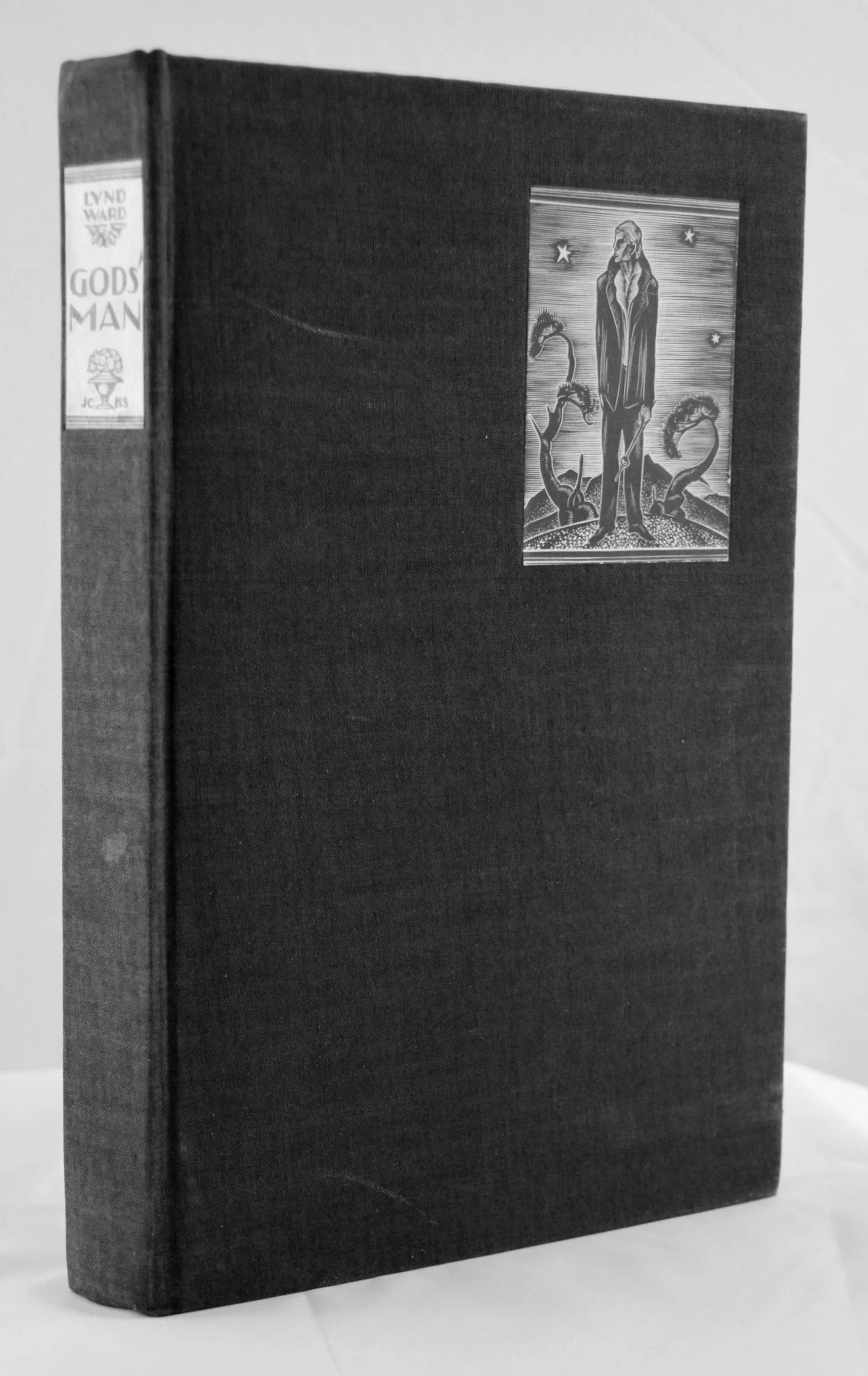Lynd Ward: Gods' Man New York: The Aldus Printers and J. F. Tapley Company for Jonathan Cape & Harrison Smith, 1929. Hardcover, octavo, 6-1/2" x 9-3/4". "Special edition, 409 copies (of which 376 are for sale)", printed directly from Lynd Ward's original wood engravings. This is number 49. Black cloth with black end papers in exceptionally good condition, with paper labels on spine and front board. One small spot on the spine visible in the accompanying photograph and two light scratches on the front cover. T.e.g.; a few pages have been carelessly opened, resulting in minor tearing to their edges. The binding is tight and square; the pages are crisp and clean; bookplate of Douglas Fairbanks, Jr. on the front paste-down. Signed by Ward on the copyright page. Lacks slip case. $1,600