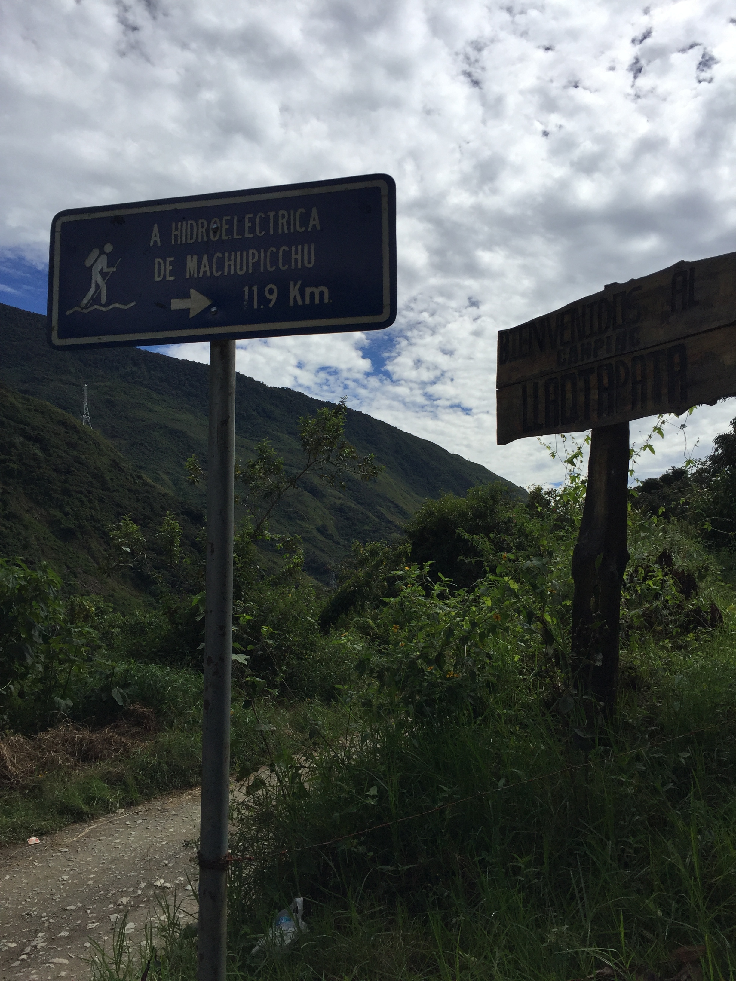Signs for the Llaqtapata pass. Be warned: you're about to add 7 miles of fun!