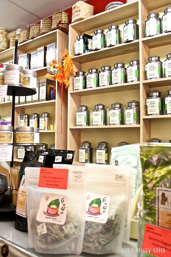 Tea Canisters Lining the Wall