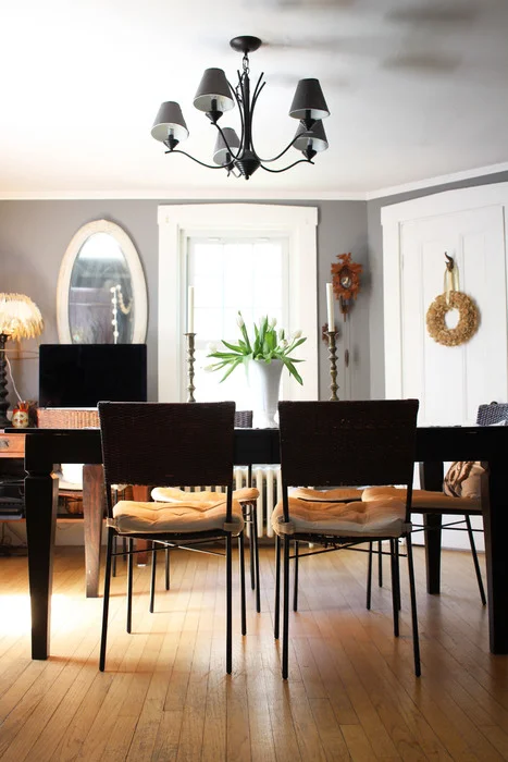 The table is now at a different orientation and Karen's two antique cuckoo clocks have taken the place of the Greek crosses. The room feels so much lighter with the new gray wall color! 