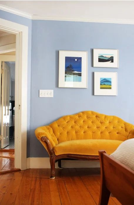 This collection of three Sabra Field woodcut relief prints hangs above our Little Yellow Couch in my bedroom. 