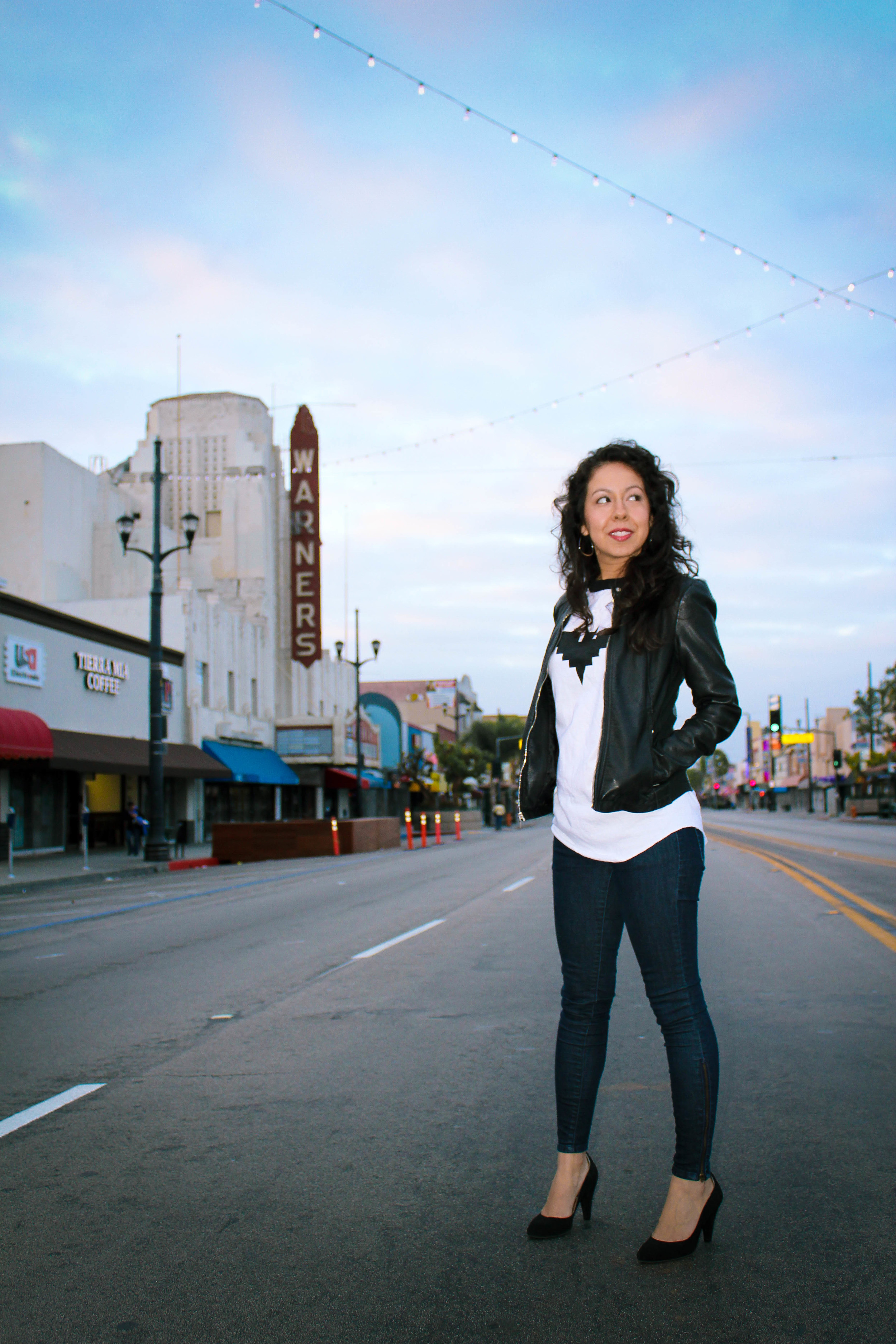 Outside the non-operational art deco Warner Theater in Huntington Park, California.