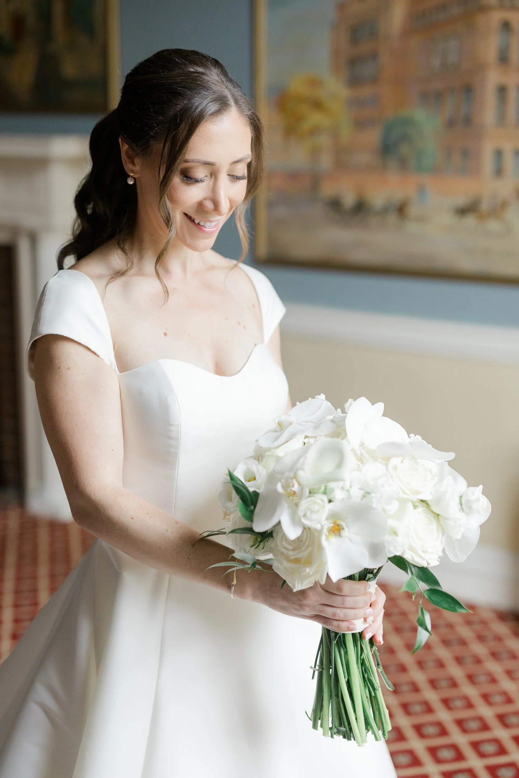 Bride holds her flowers at the Harvard Club of Boston Wedding