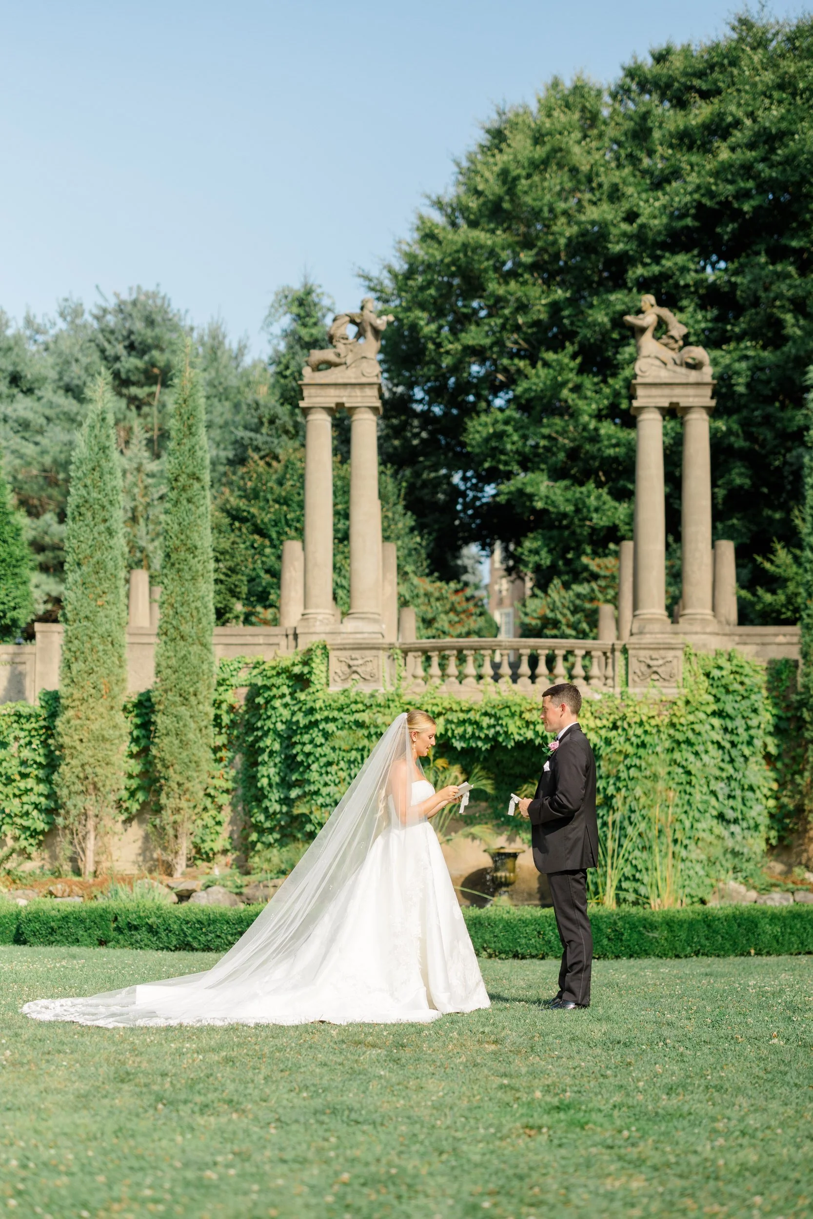 Wedding Couple reading their vows at the Crane Estate