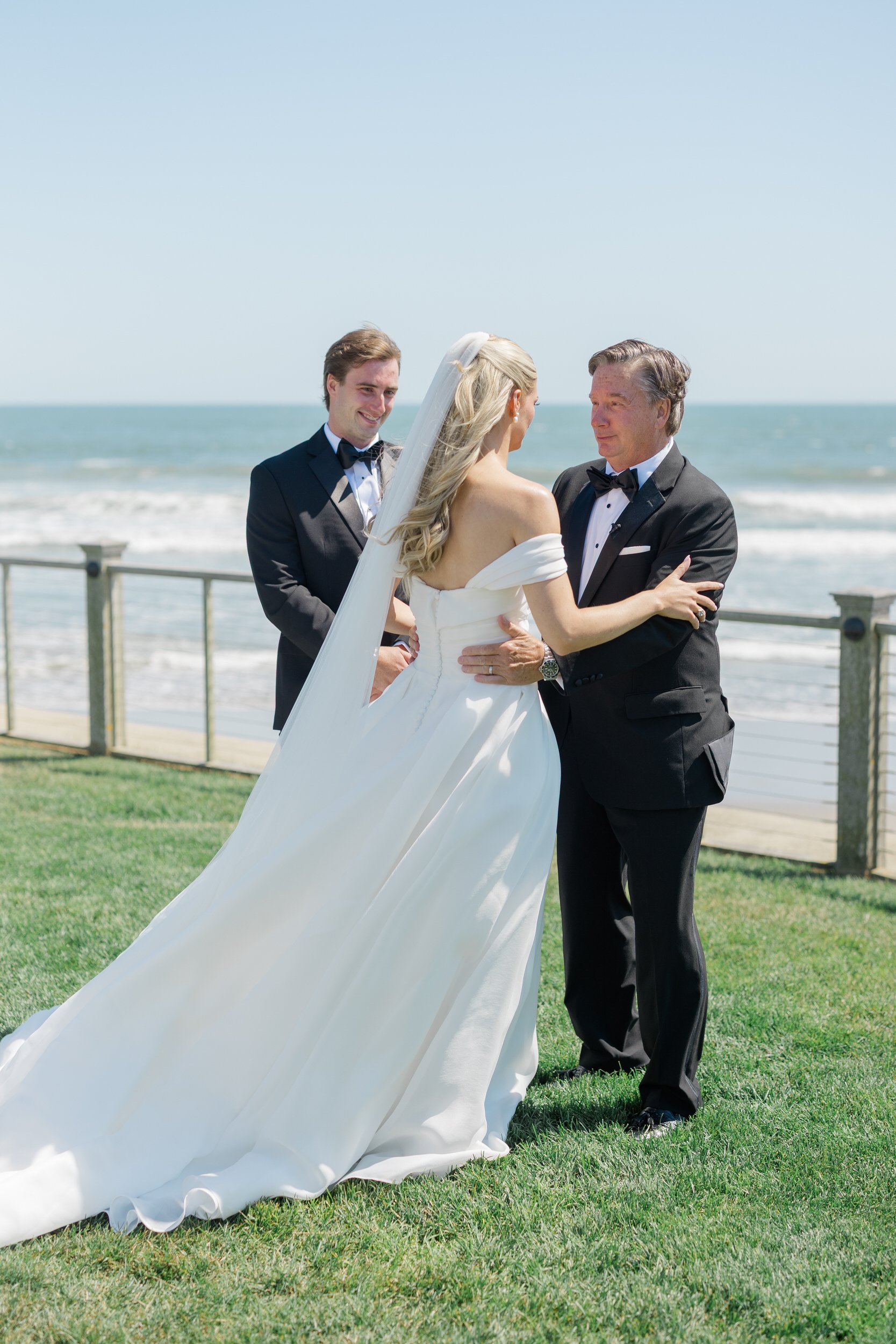 Bride and father first look at the Dunes Club Wedding