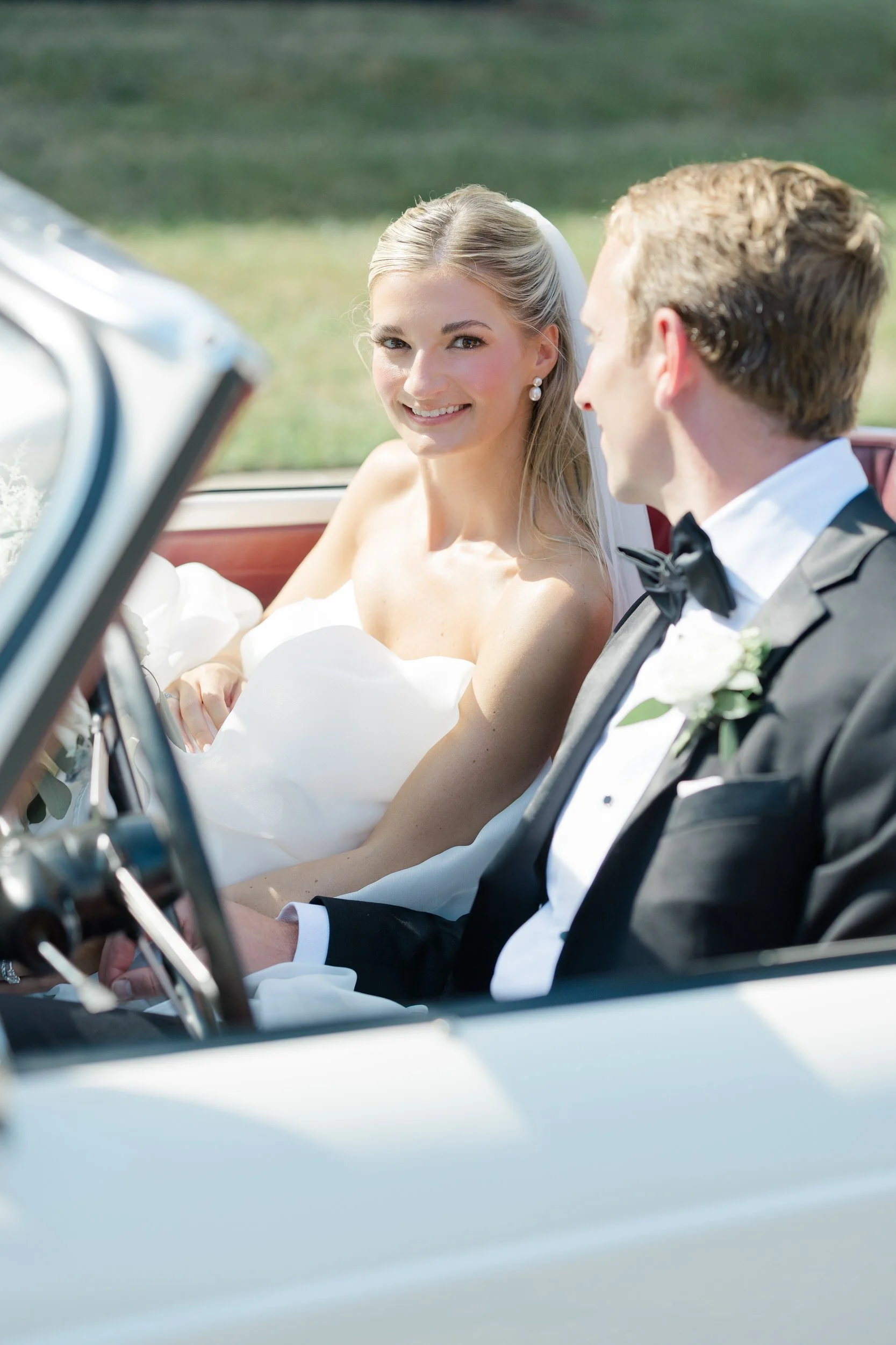 Couple's portraits at St Thomas More Church Wedding