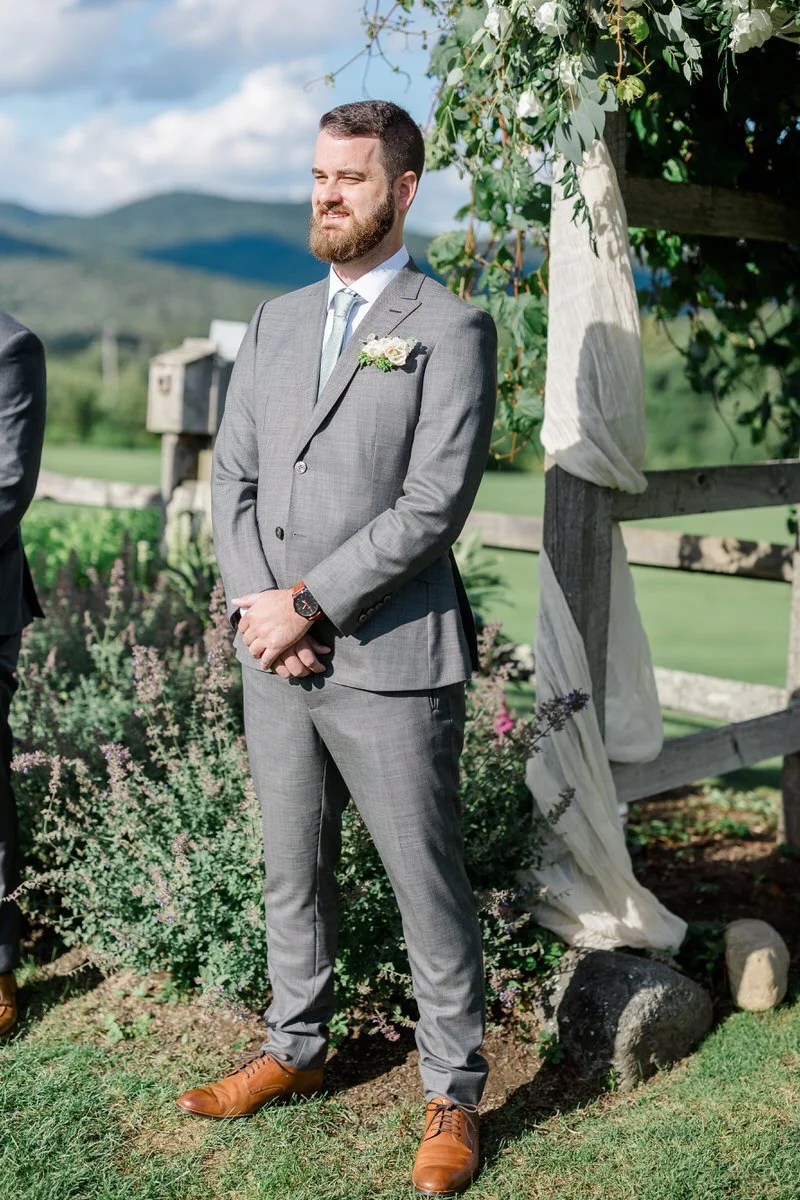 Groom watches as bride walks down aisle at Mountain Top Inn Vermont Wedding