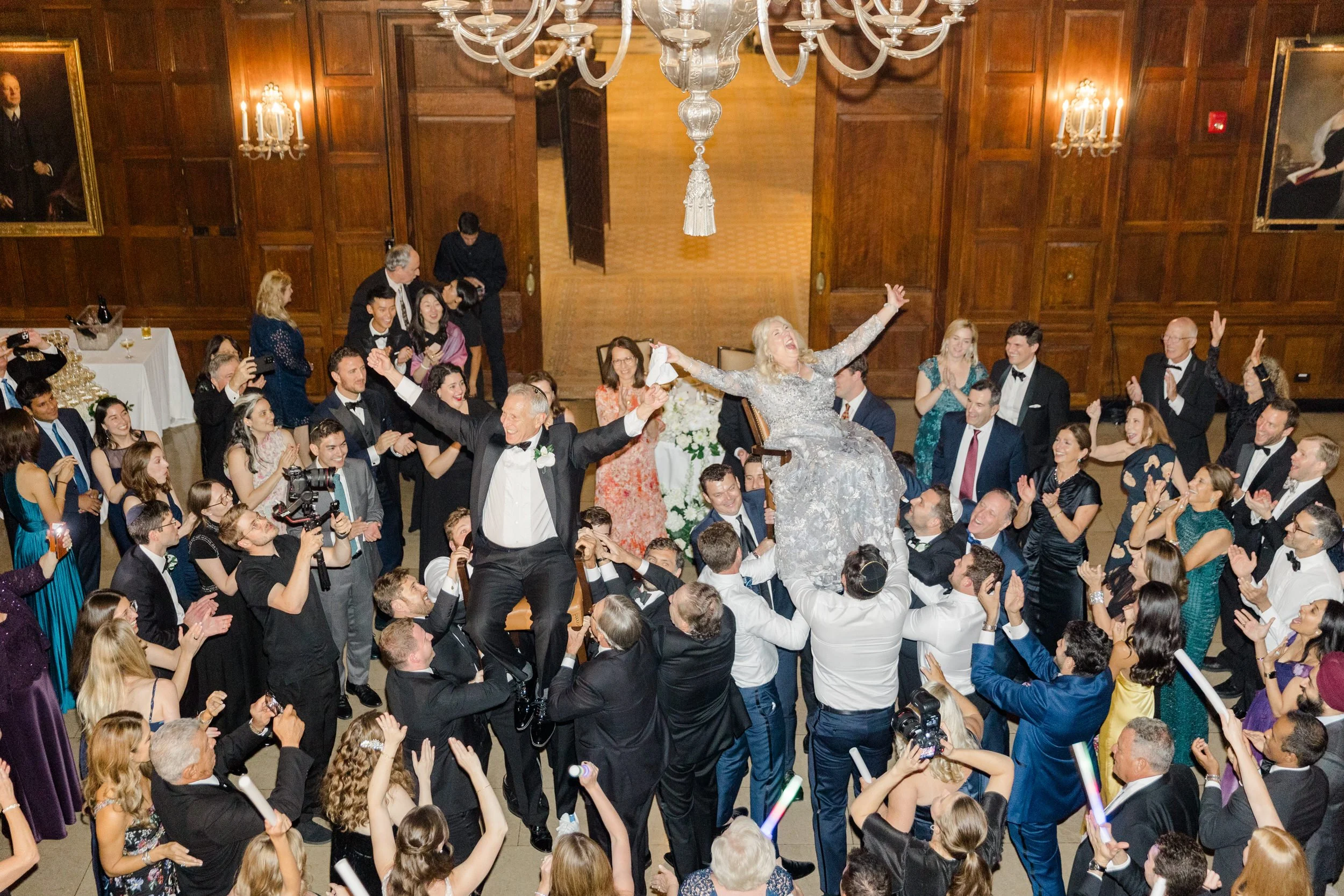 Parents dance the hora at the Harvard Club of Boston Wedding