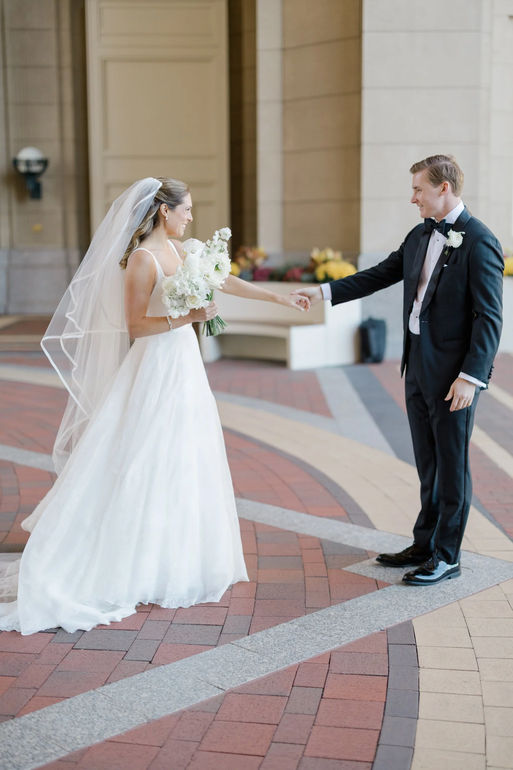 Bride and groom first look  at Boston Harbor Hotel Wedding