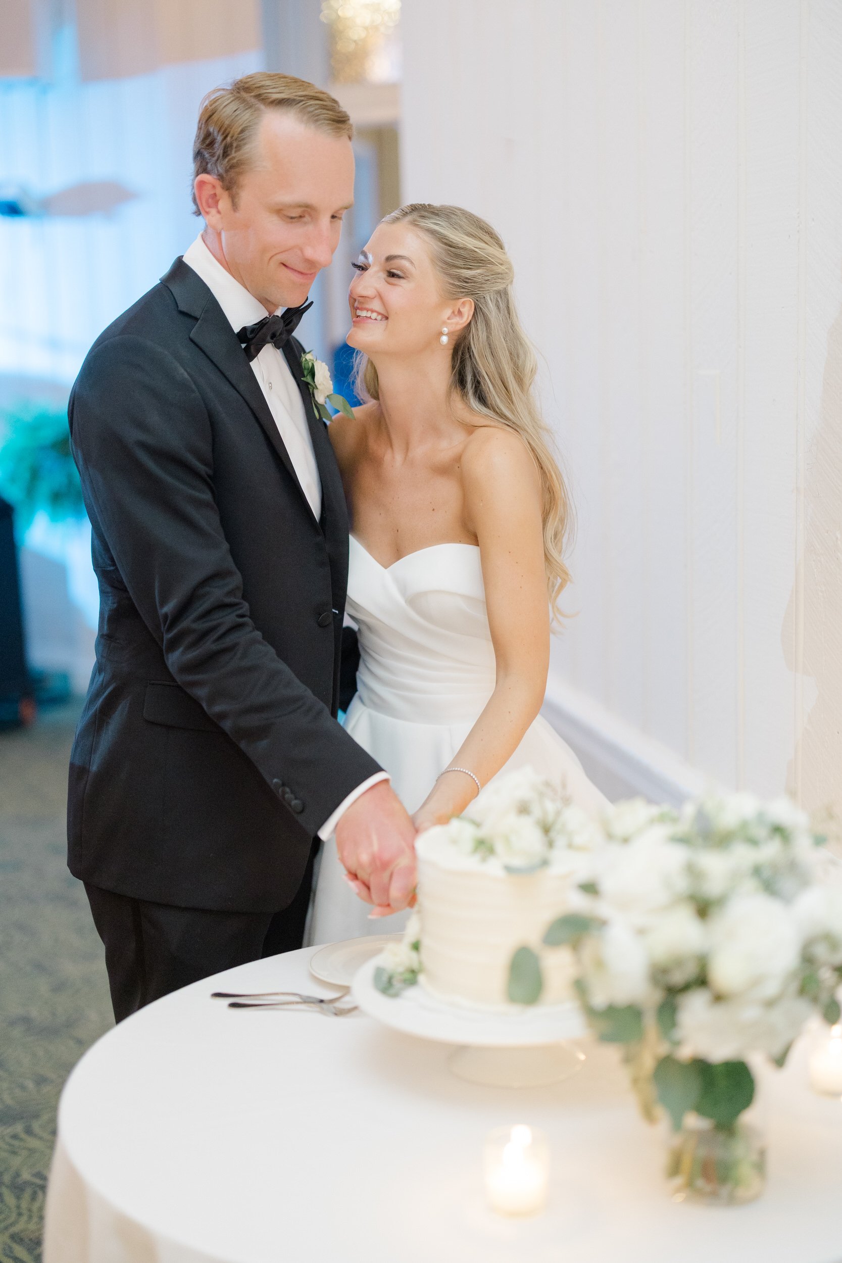 Cake cutting at the Dunes Club Wedding