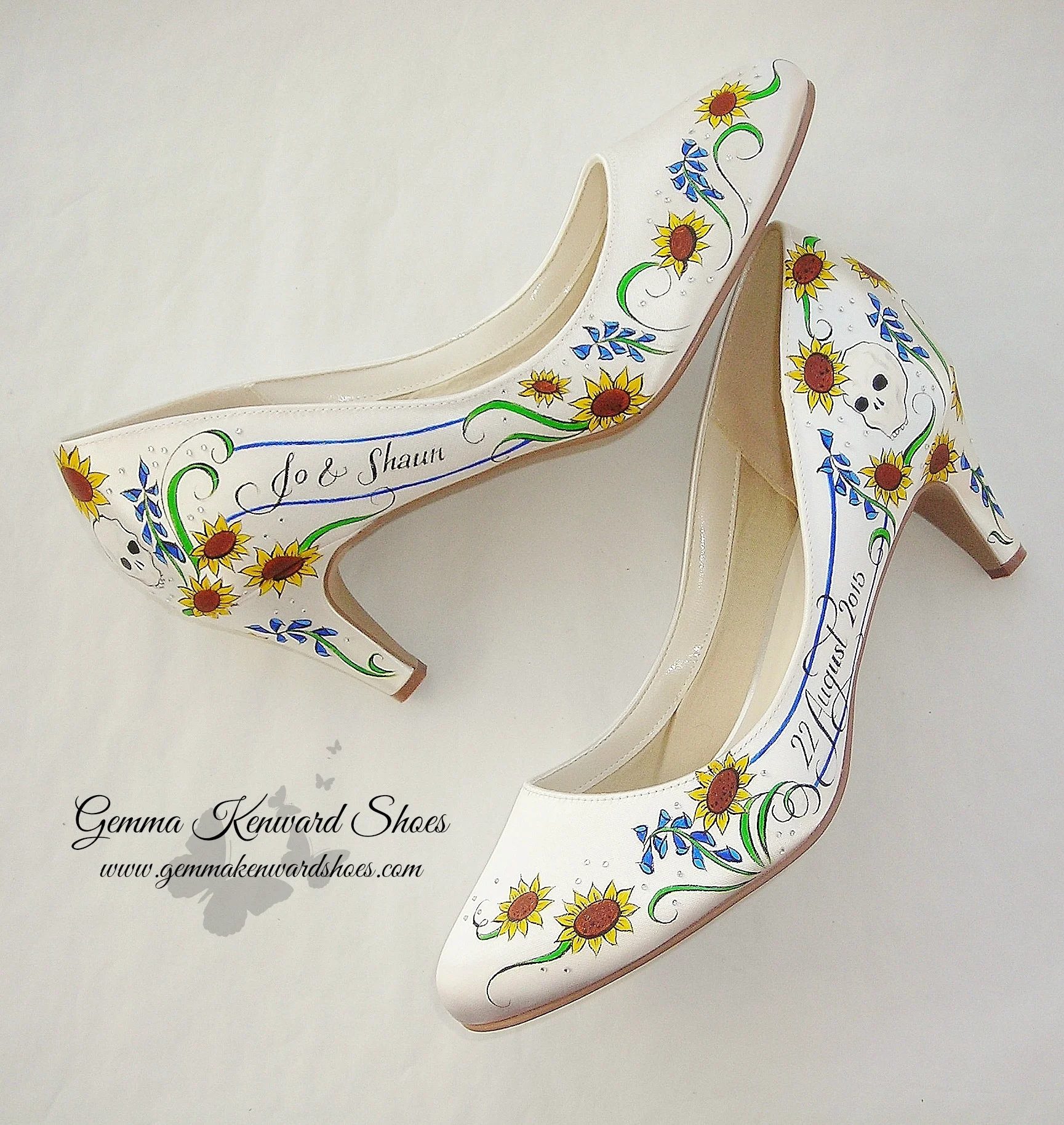 Personalised bridal shoes for a bride with flowers and skulls, adorned with diamonds / diamantes 