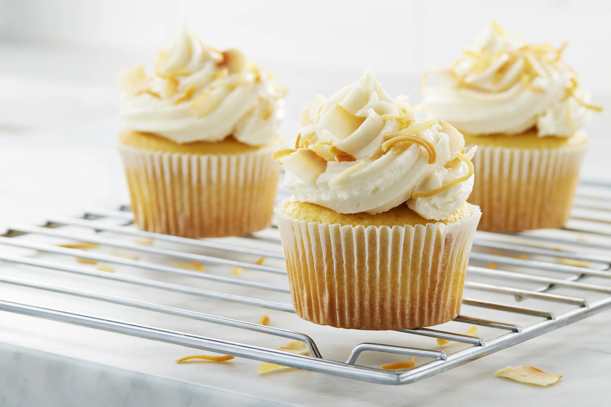 Toasted Coconut Cupcakes Photographer: Jimmy Eagle