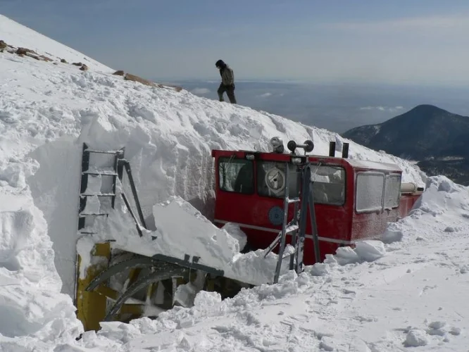 cog railway removing snow, operating in April to late June depending on the weather