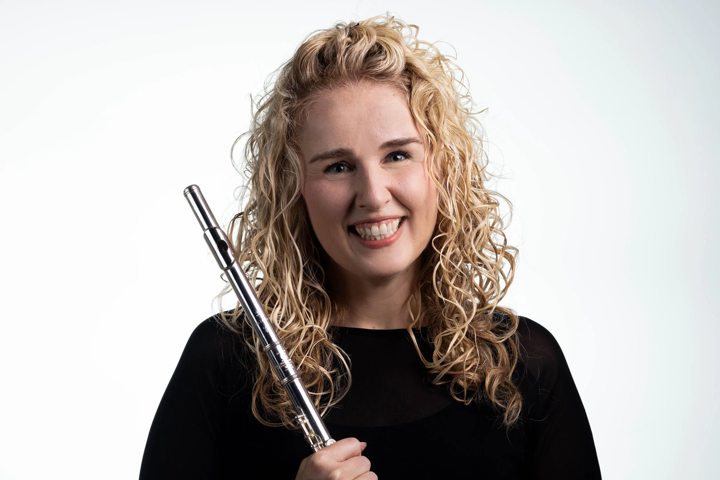 Jennifer Gartley holding a flute