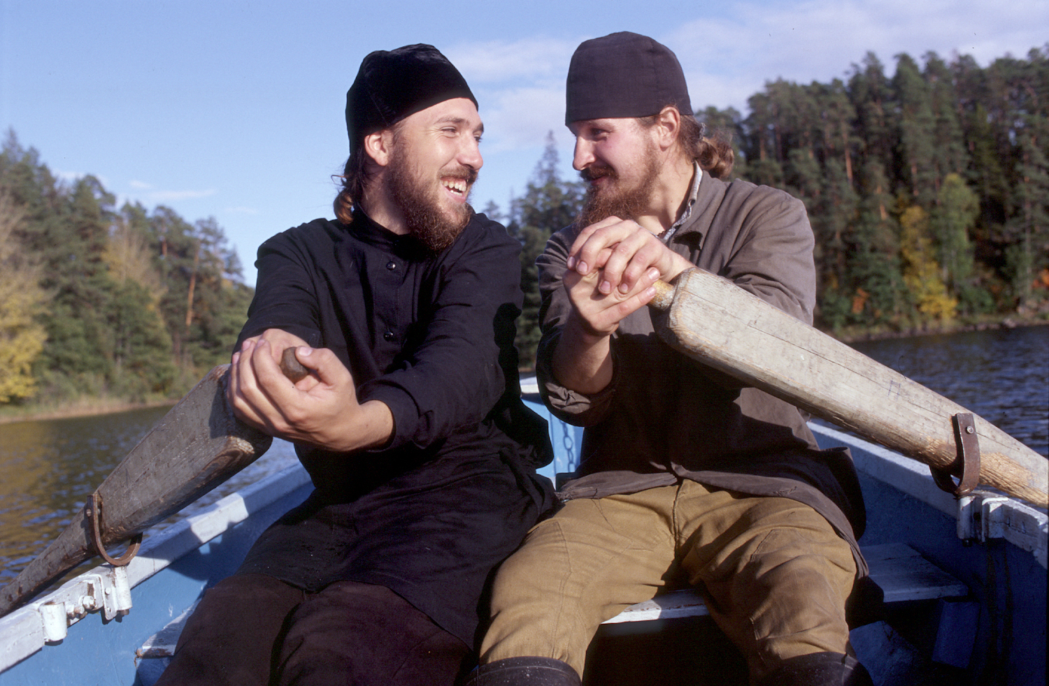 Andrey and Alexei take a rowboat to the farm that provides food for the monastery. Both intend to become monks and await the blessing of the abbot.