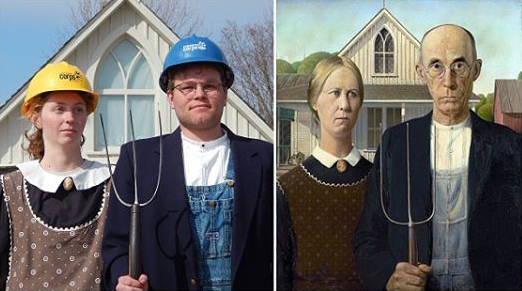 Iowa corps members Sara Anderson and Derek Bean pose in front of the famed American Gothic house in Eldon, Iowa.