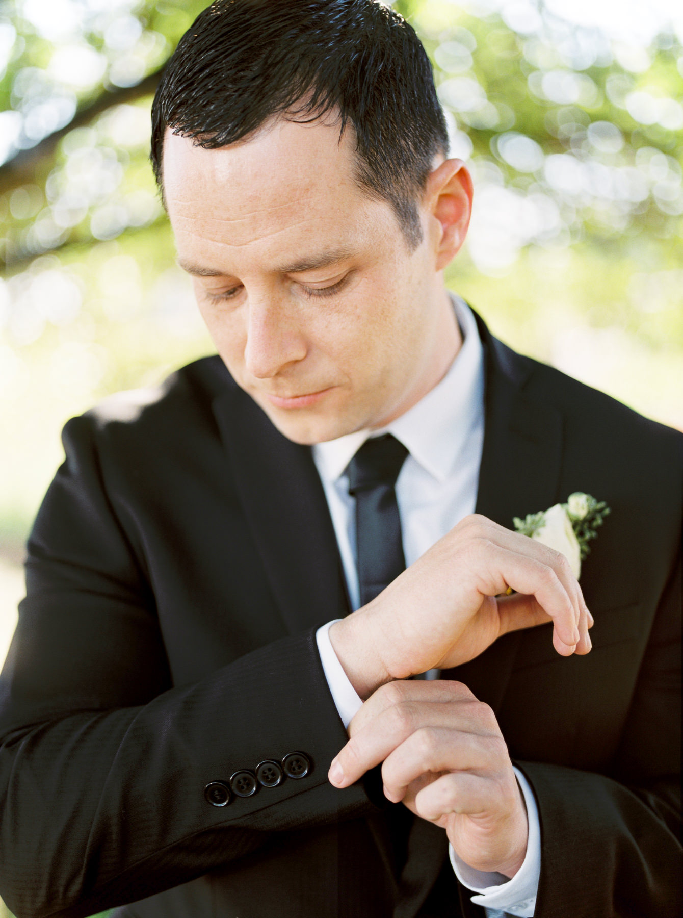 Groom getting ready for wedding