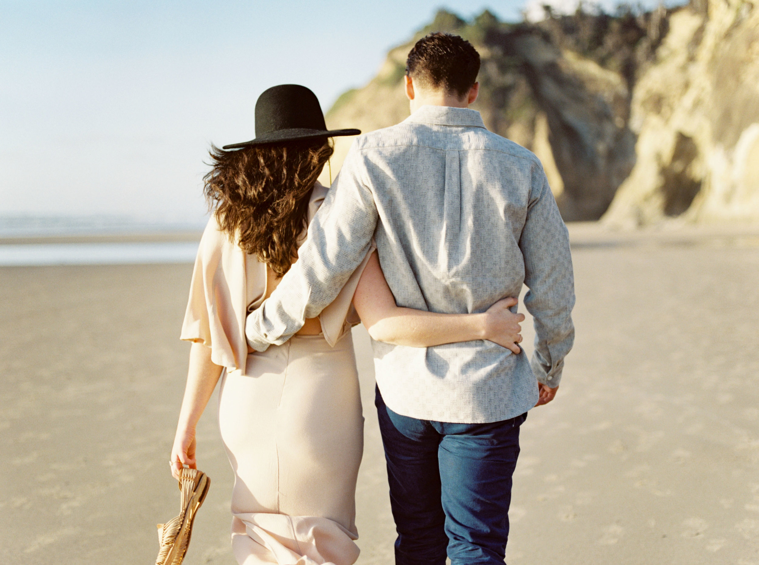 Oregon Engaged Couple Walking on Beach