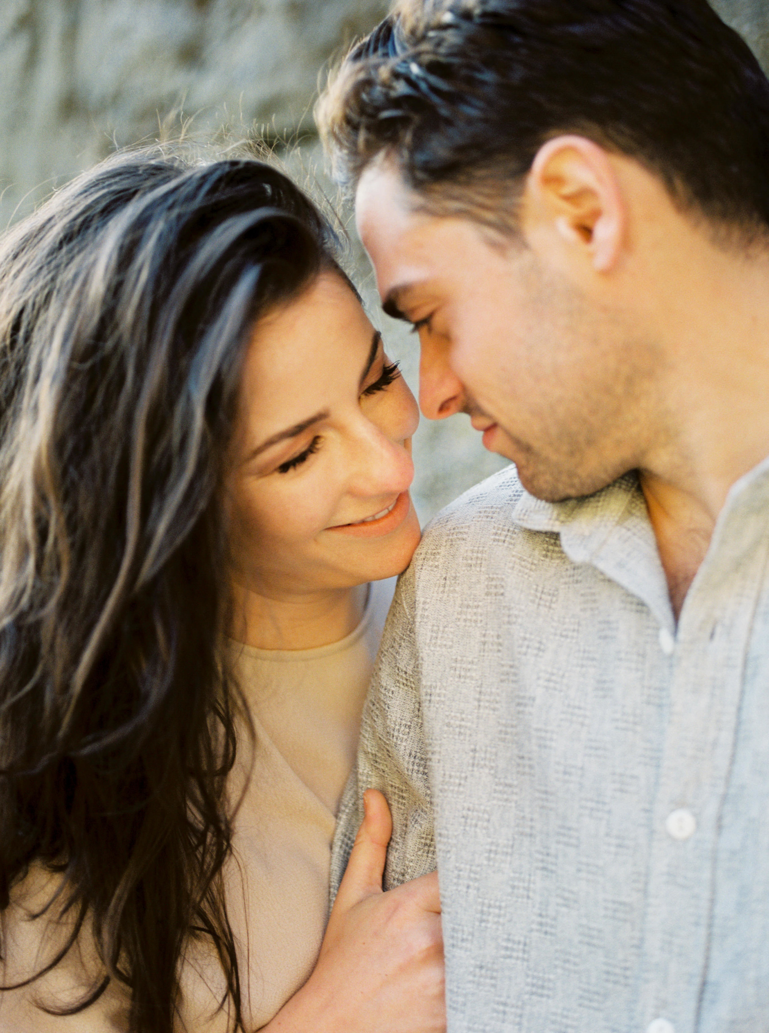 Cute Portland Couple cuddling for engagement photos