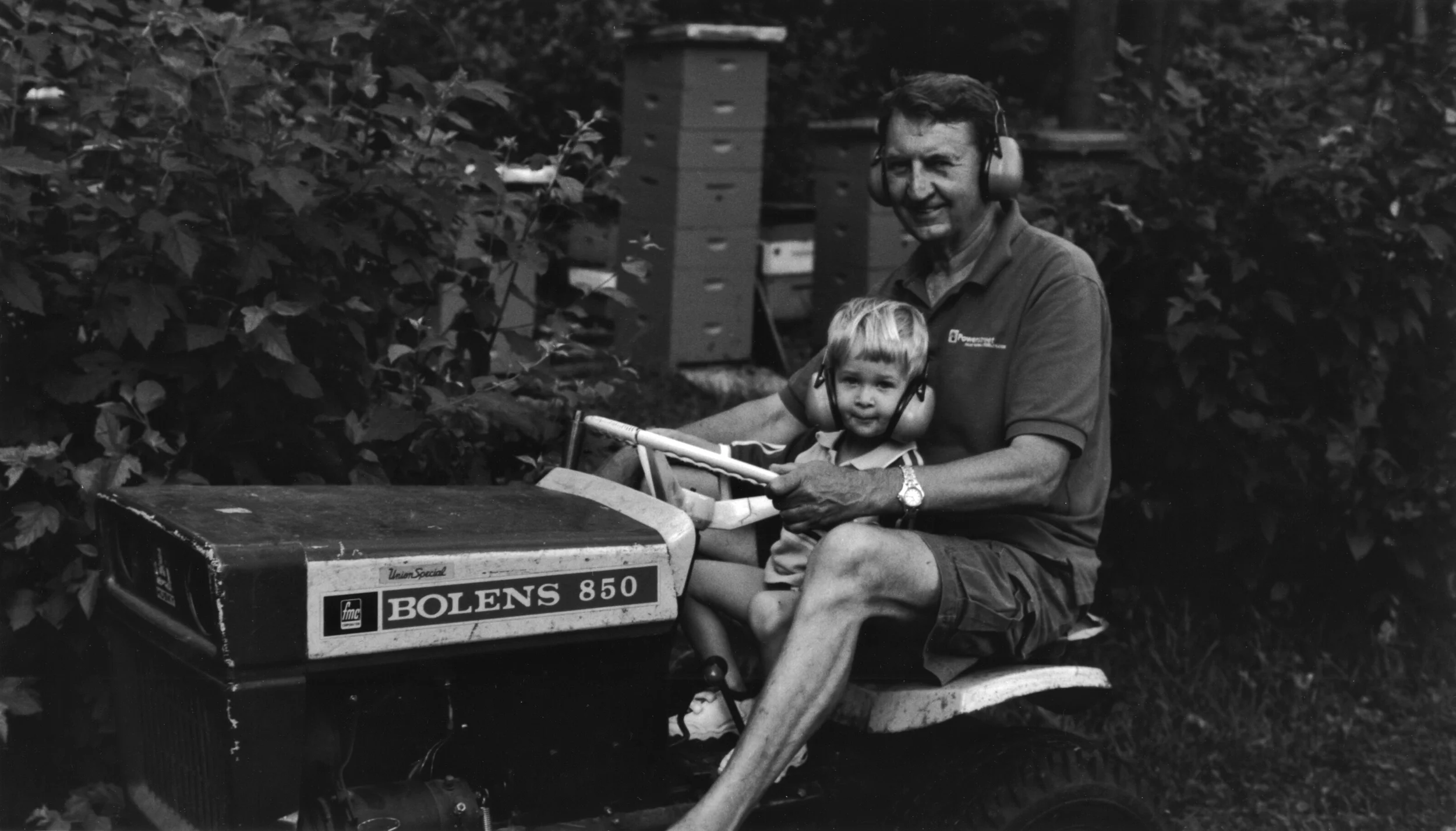 ryan on tractor with deda.jpg