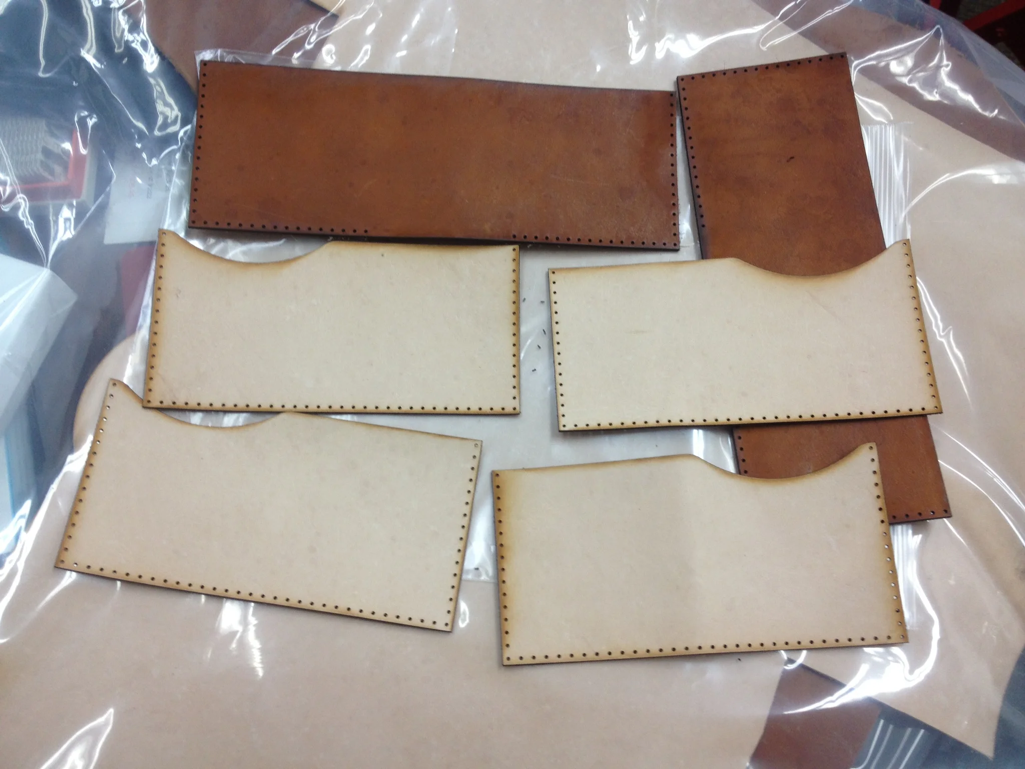 laser cut proto wallet parts.jpg