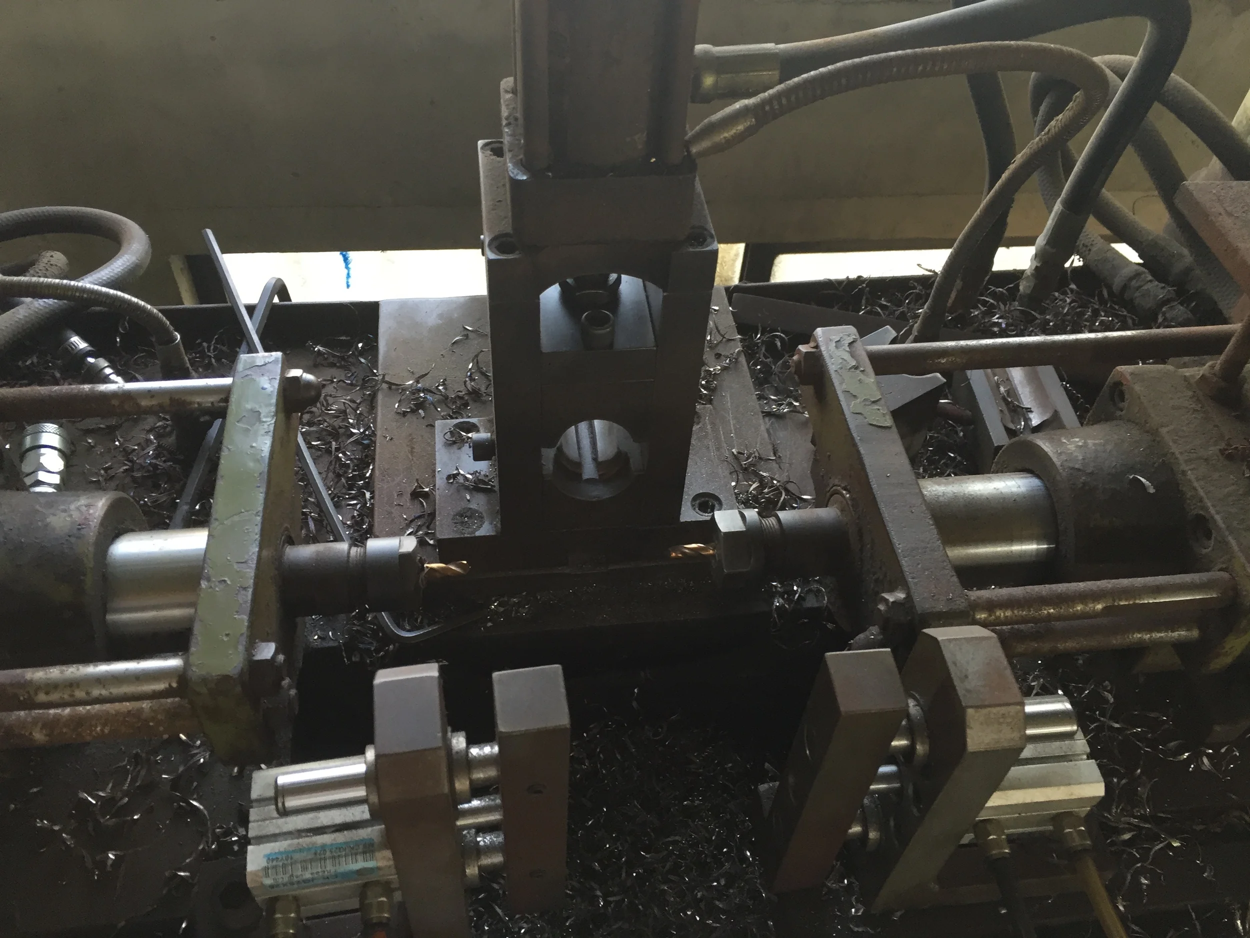 I really like this machine. It drills brake holes in the fork - from both front and back.